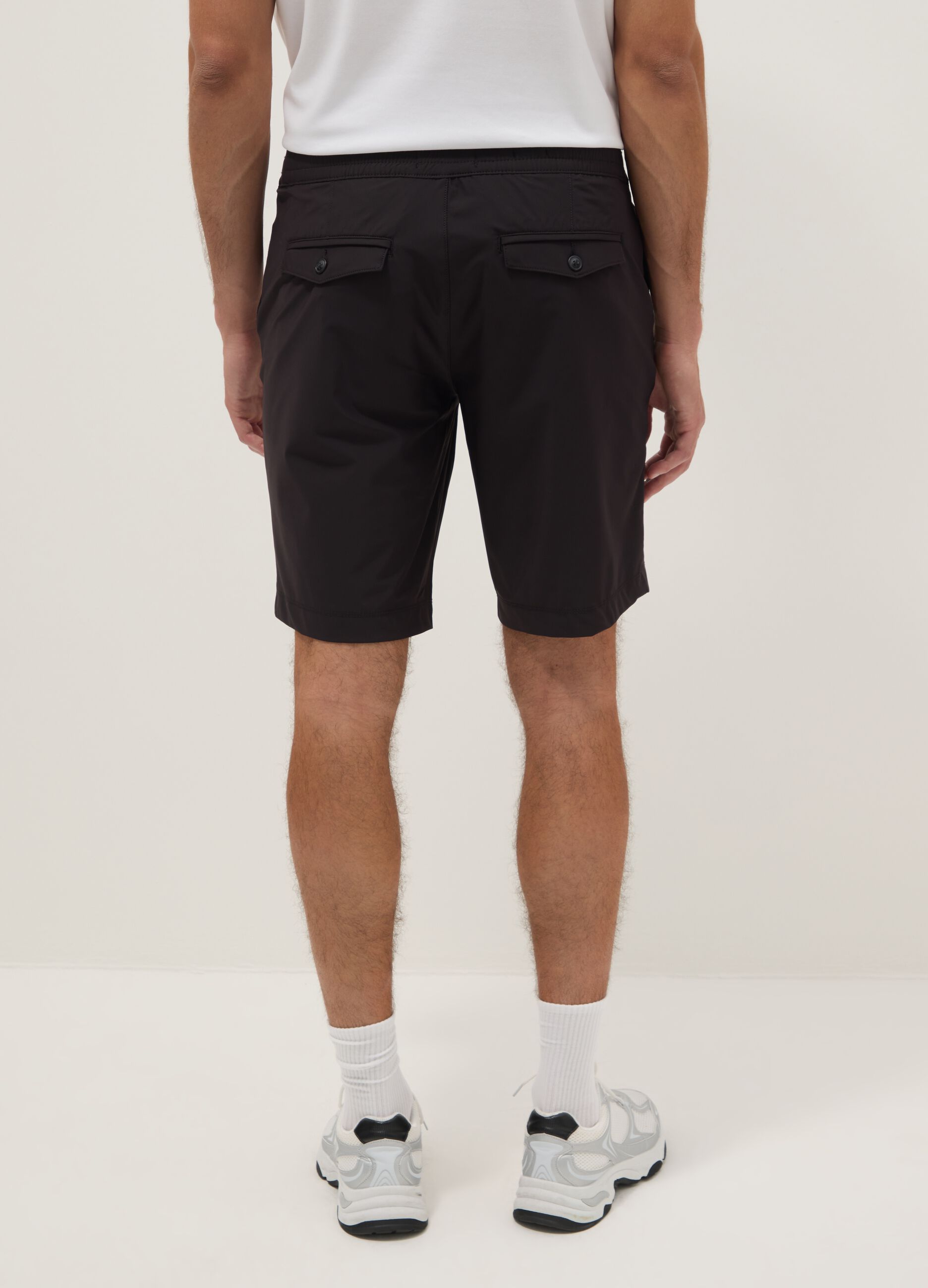 Black regular-fit stretch jogger Bermuda shorts
