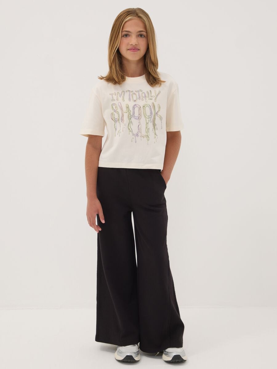 Black wide-leg trousers in pure cotton_0