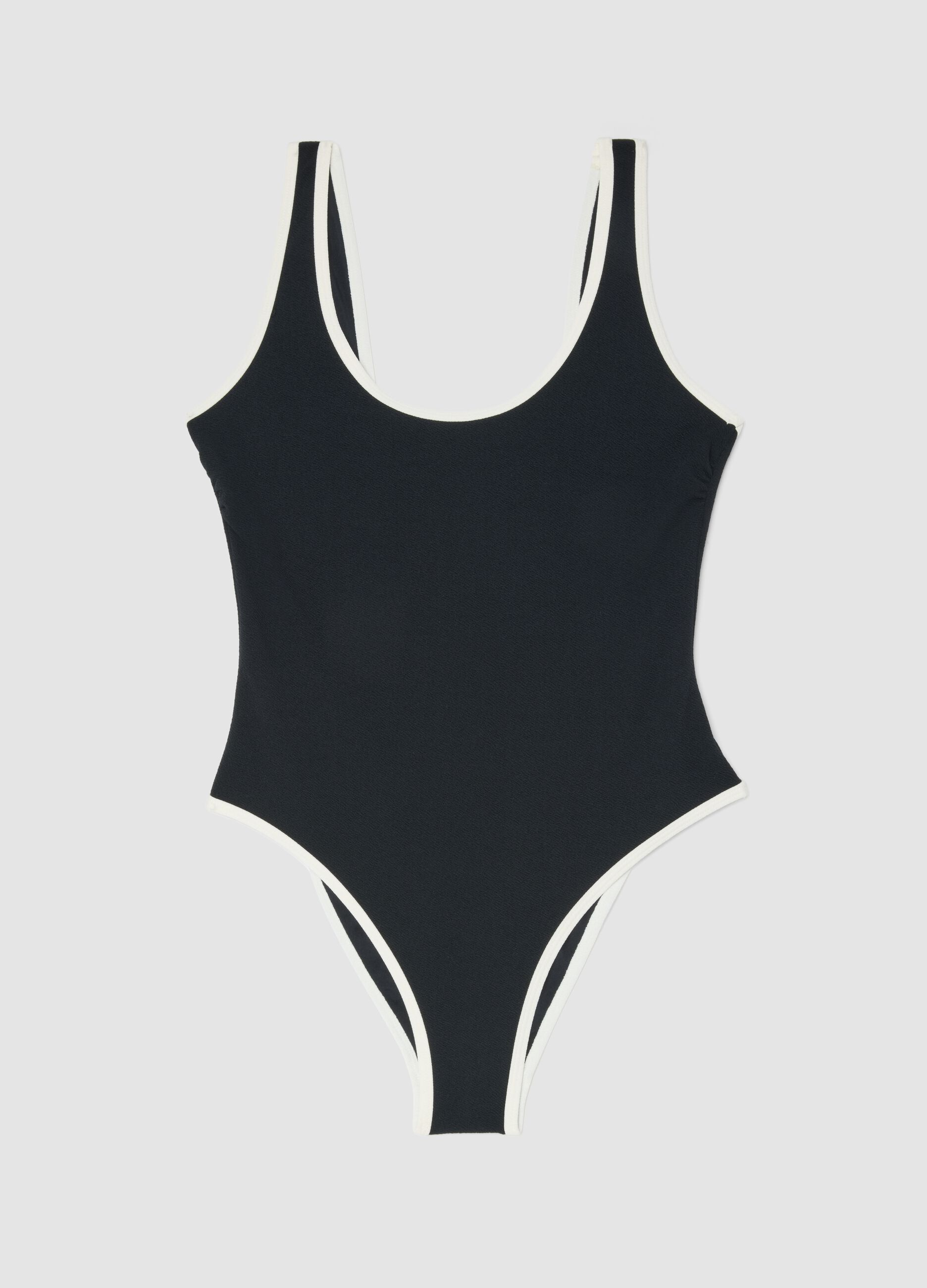 Schwarzer One-Piece-Badeanzug aus Stretchmaterial mit weissen Abschl&uuml;ssen