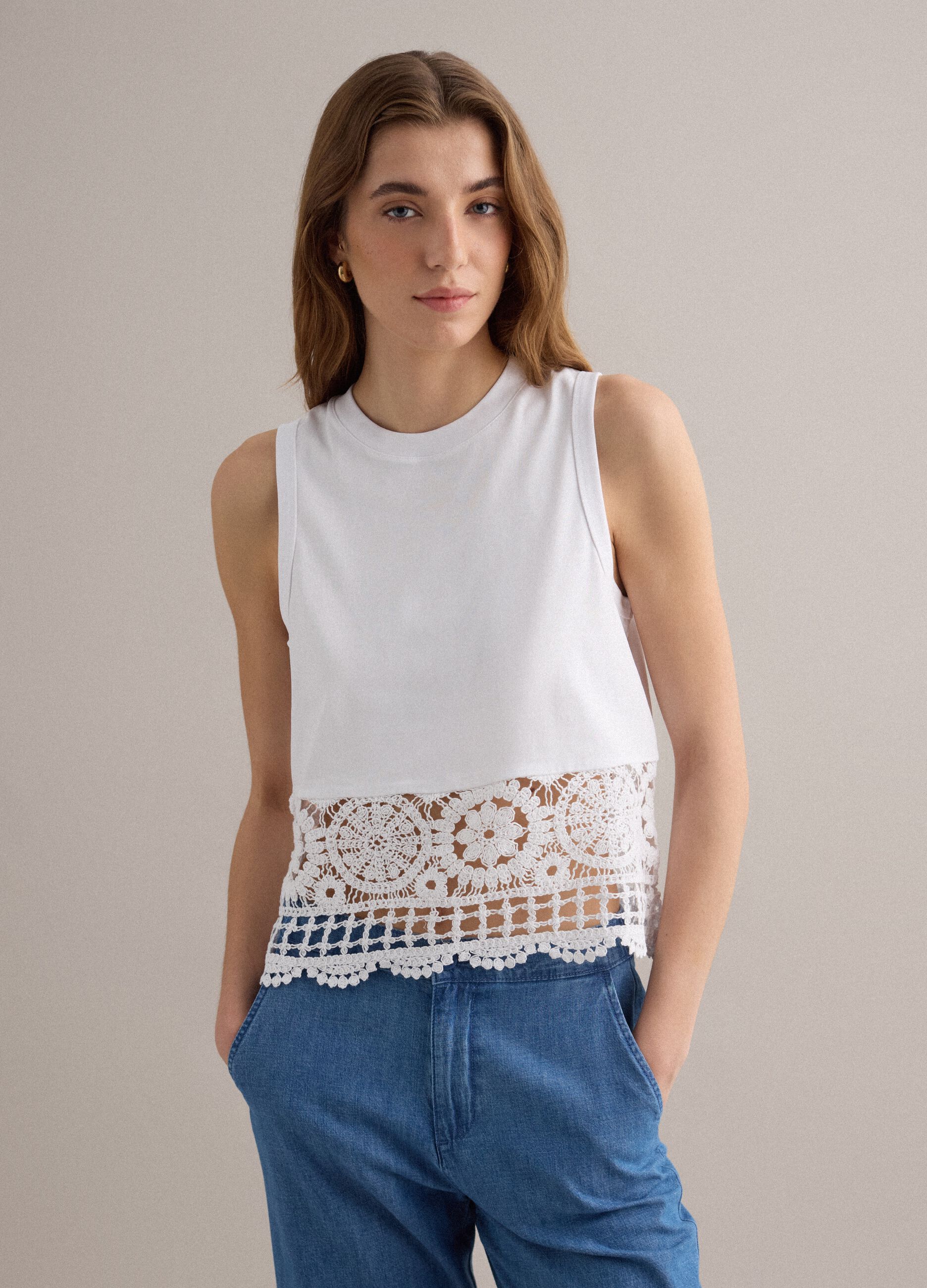 White cotton-blend vest top with lace detailing