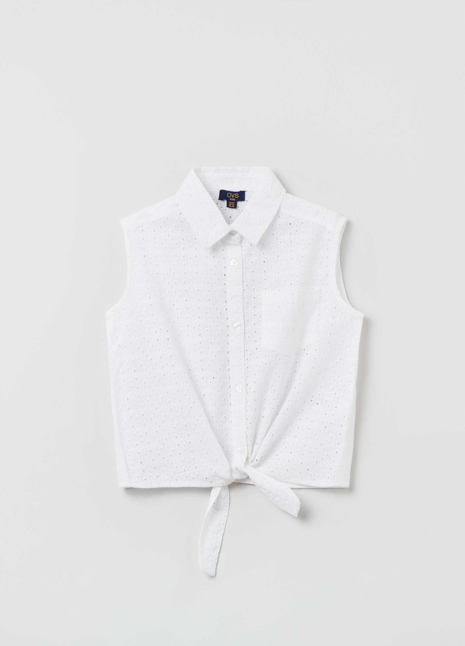 Sleeveless shirt in broderie anglaise