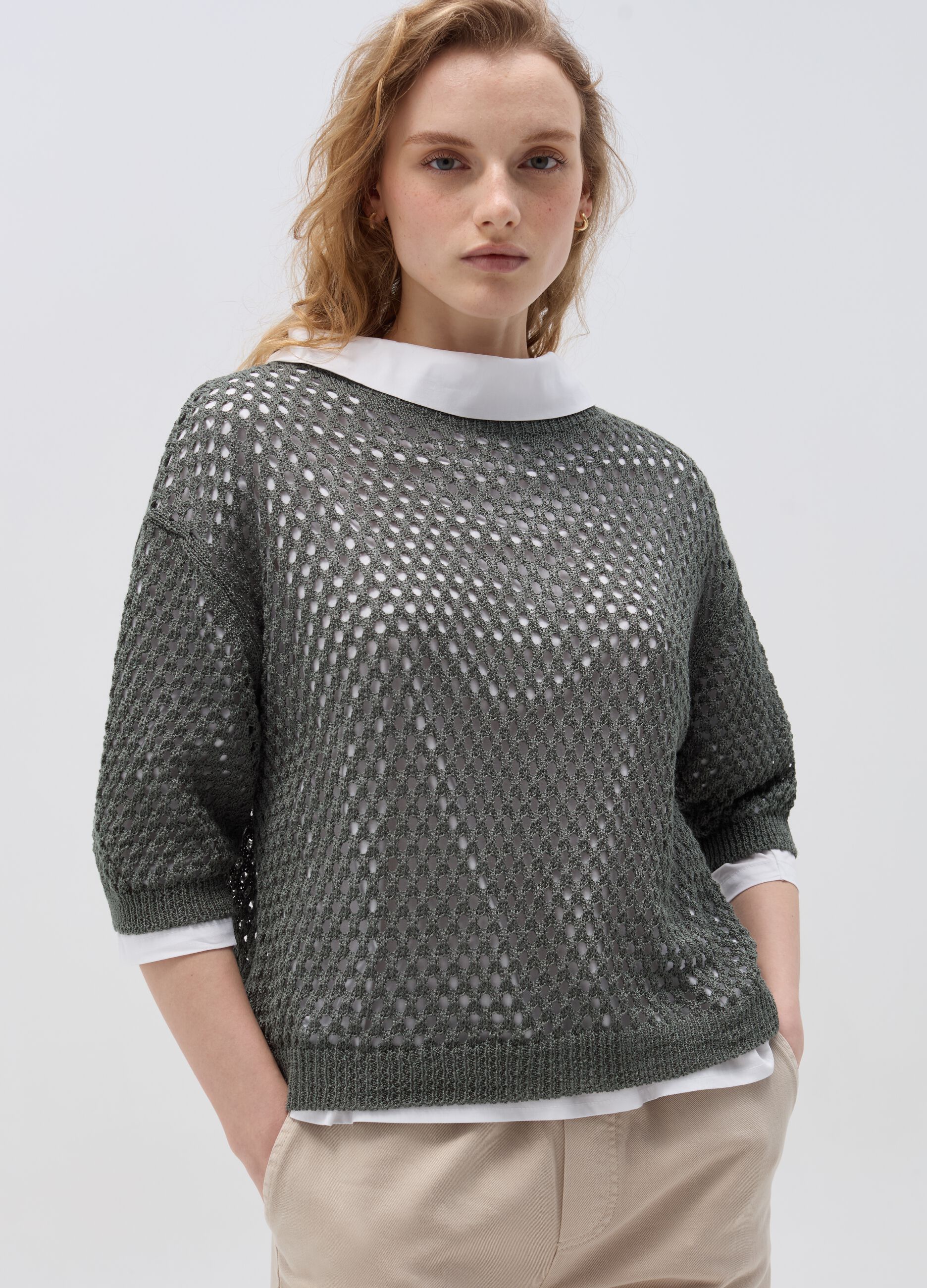 Pullover with open stitch design