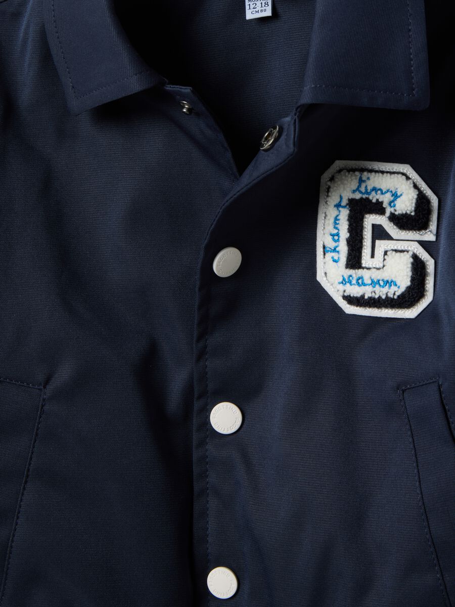 Regular fit blue jacket with striped cuffs for boys_2