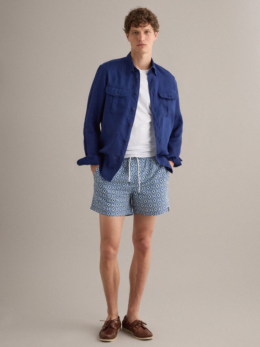 Blue swim shorts with geometric print_3