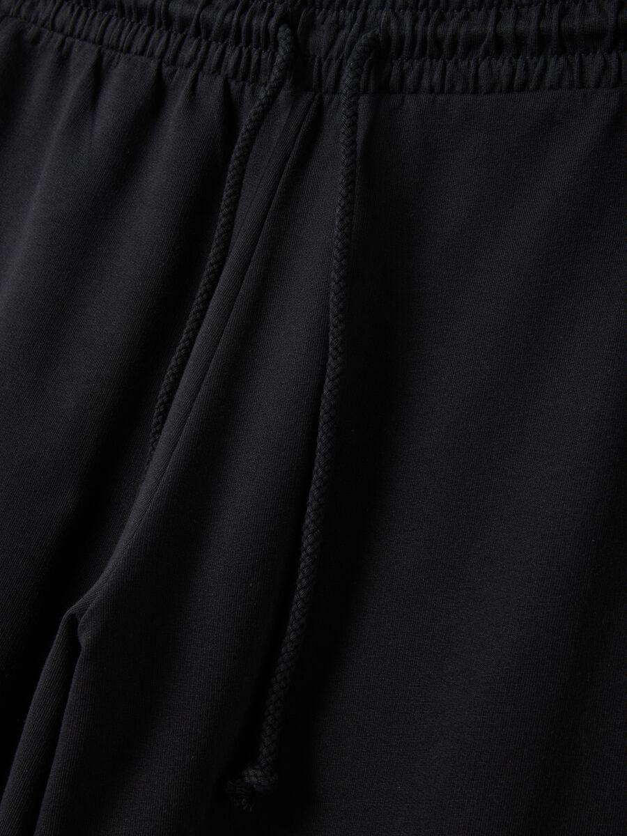 Black baggy-fit pure cotton jogger trousers_1