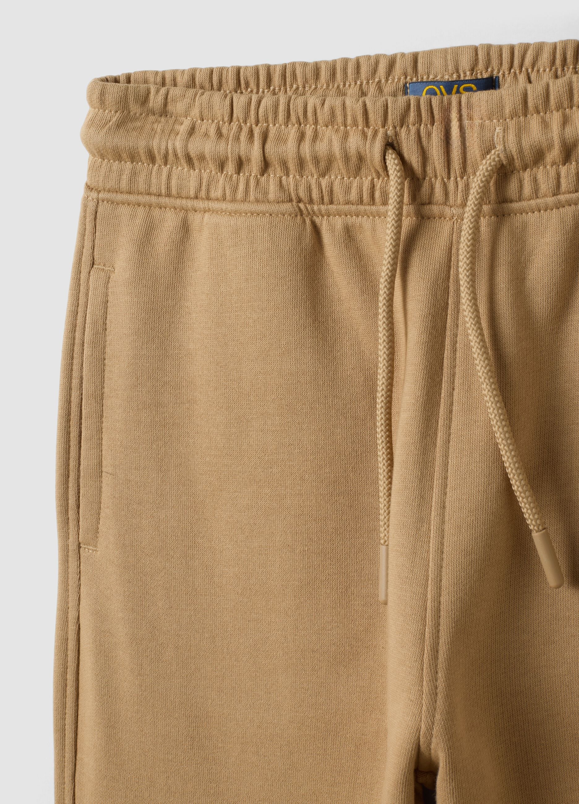 Beige cotton-viscose blend joggers with contrasting print for boys