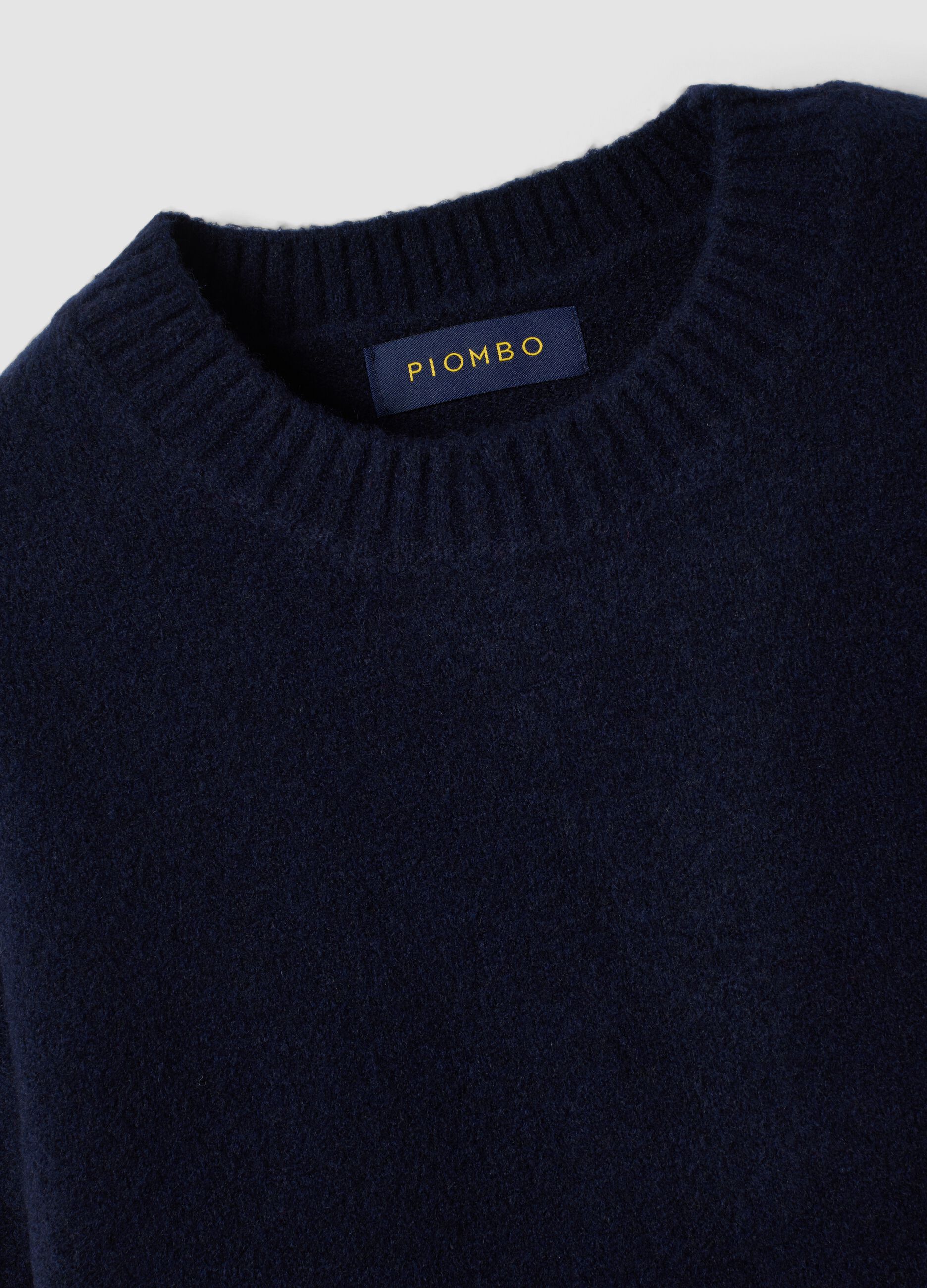 Maglia blu navy in lana elasticizzata con girocollo
