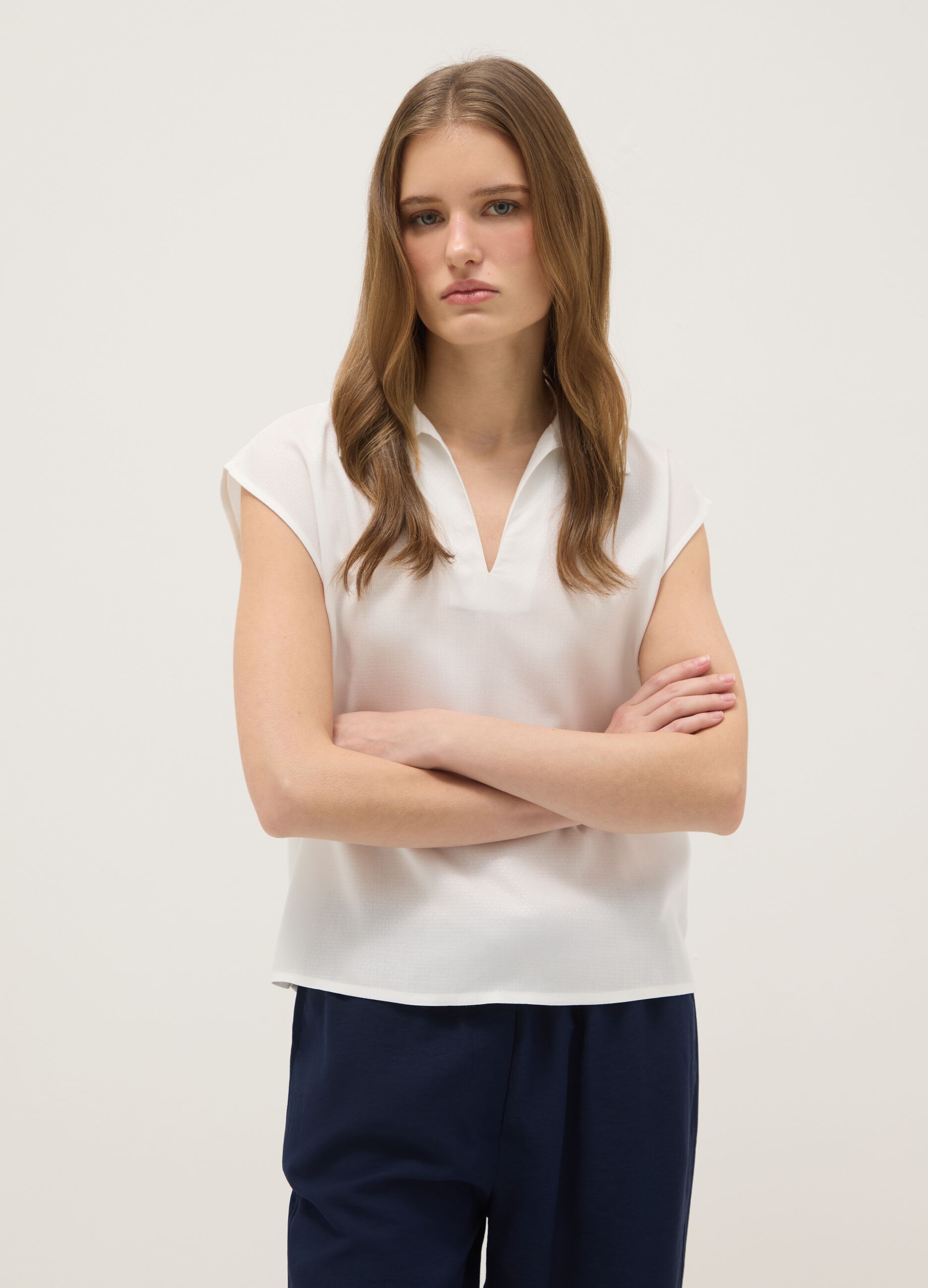 White sleeveless blouse in pure viscose regular fit with V-neck