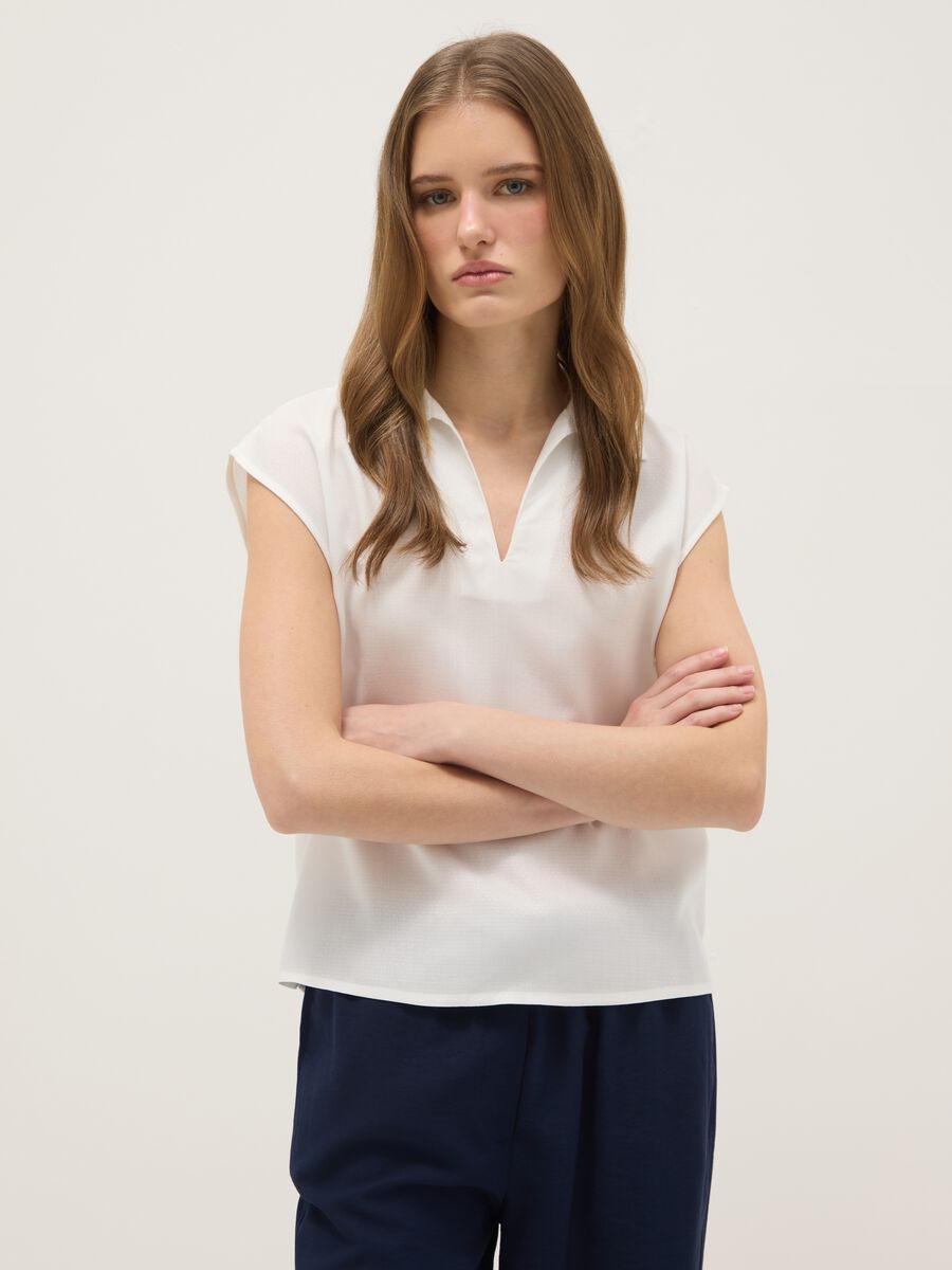 White sleeveless blouse in pure viscose regular fit with V-neck_0