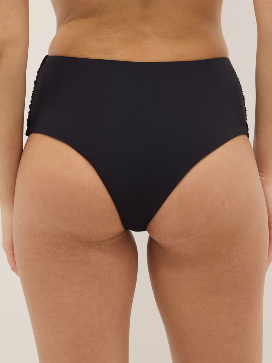 Black bikini bottoms with knotted detail in stretchy shaping fabric_2