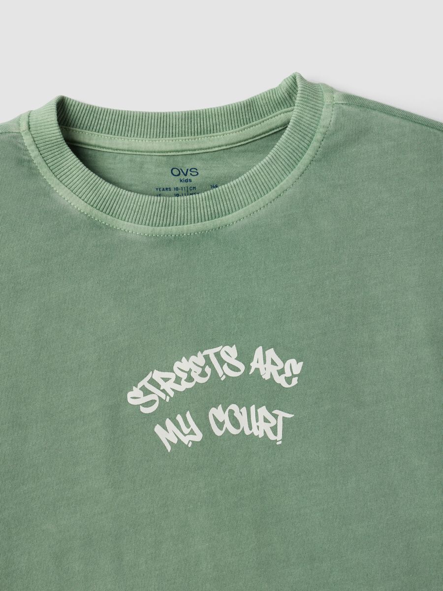 Green oversized pure cotton T-shirt with "Streets are my court" slogan for boys_5