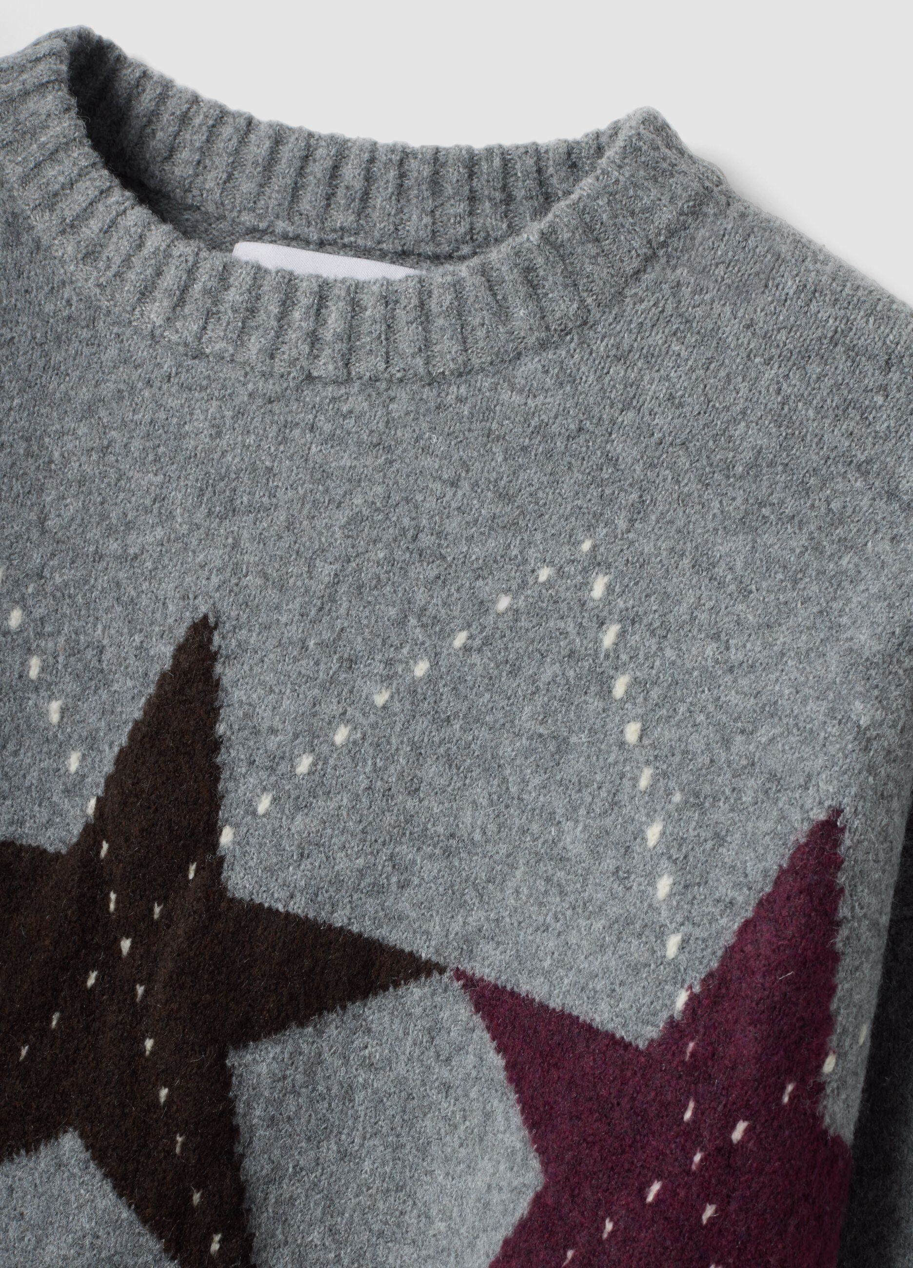 Maglia grigia in tessuto elasticizzato con motivo a stelle over fit