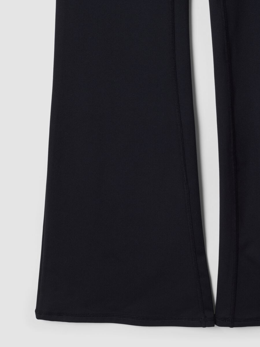 Blue flared leggings in stretchy fabric_8