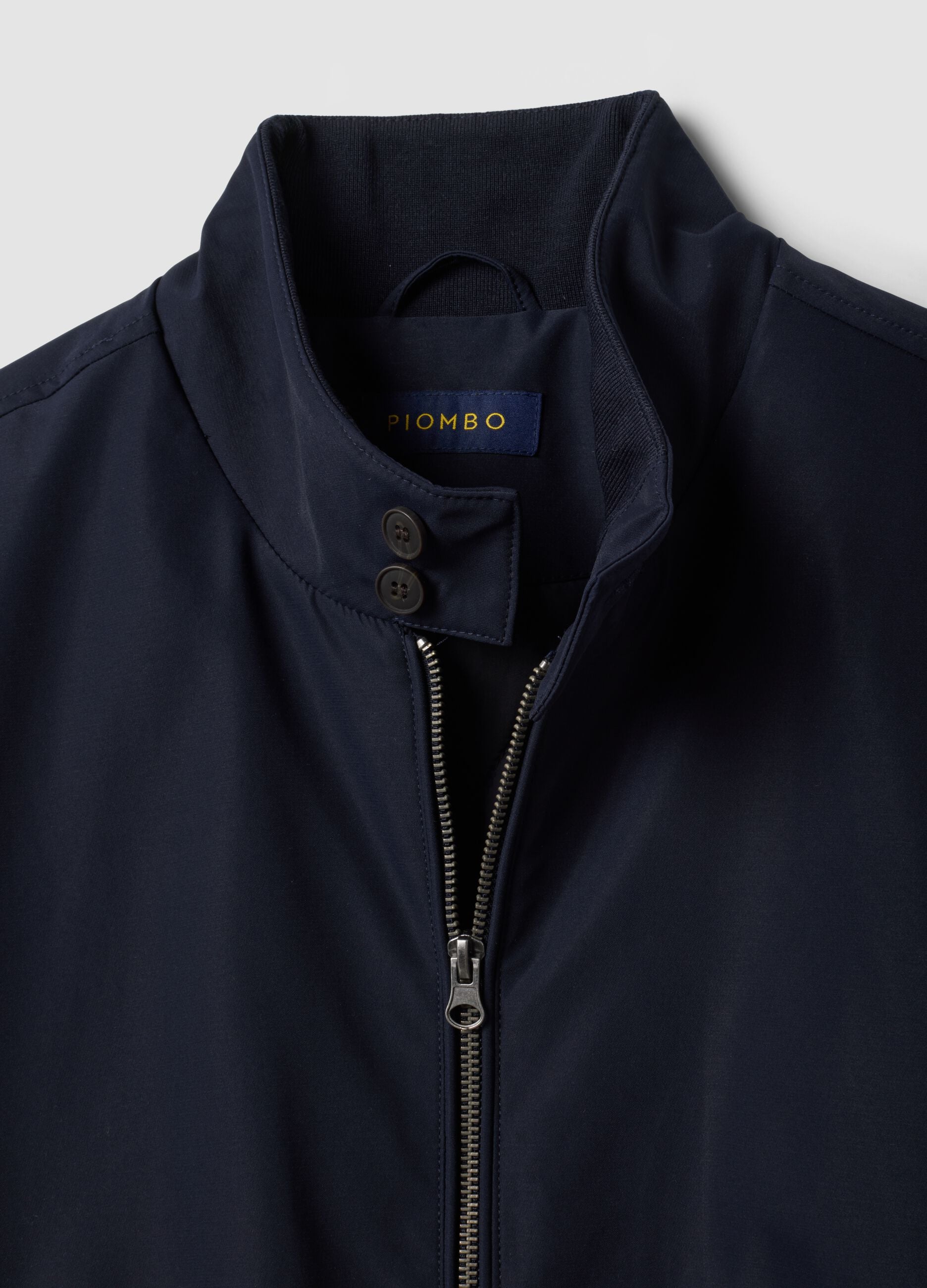 Navy blue regular-fit jacket with zip and high collar