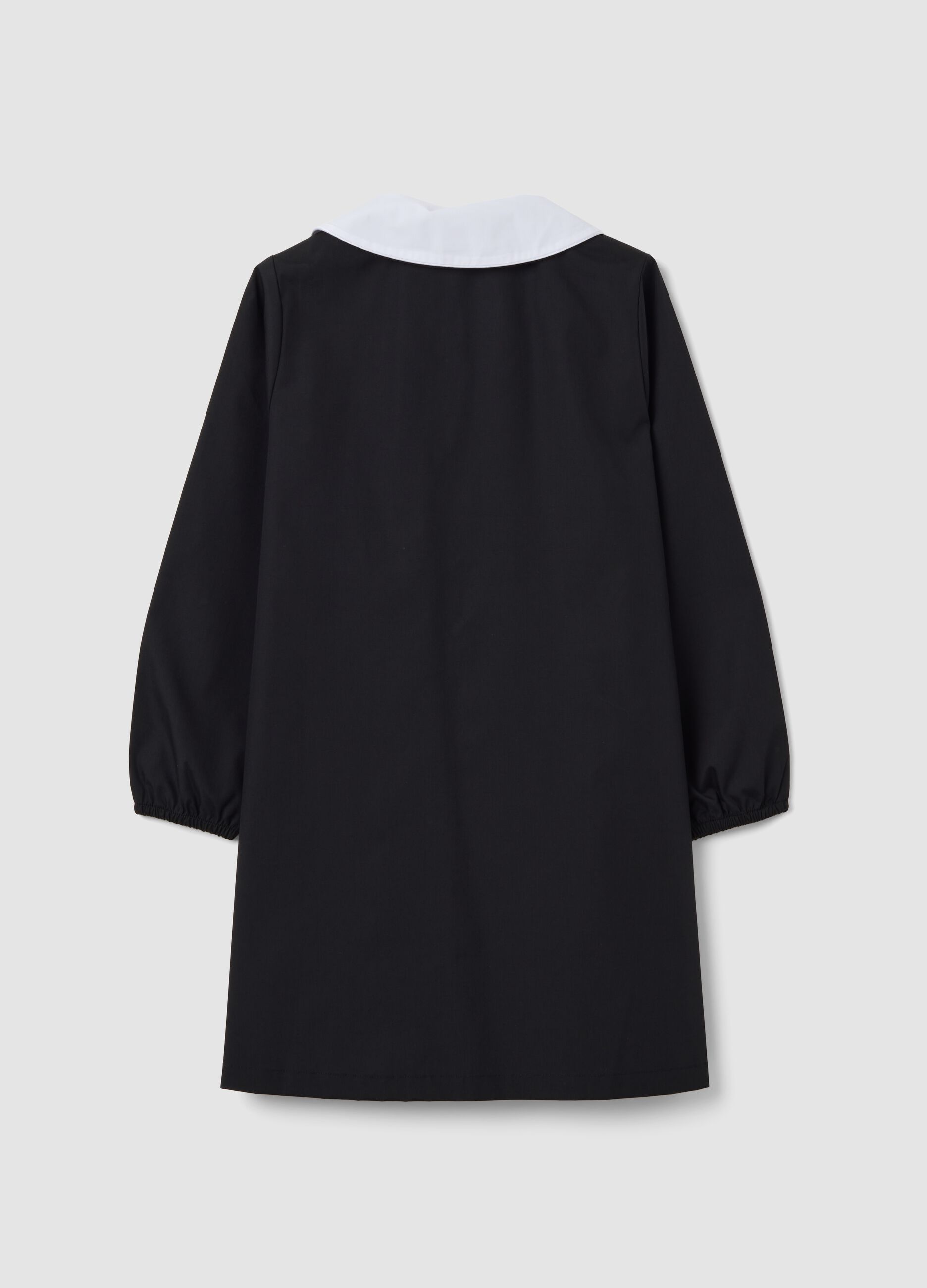 Black girls&rsquo; school apron with zip and white collar, Stitch embroidery