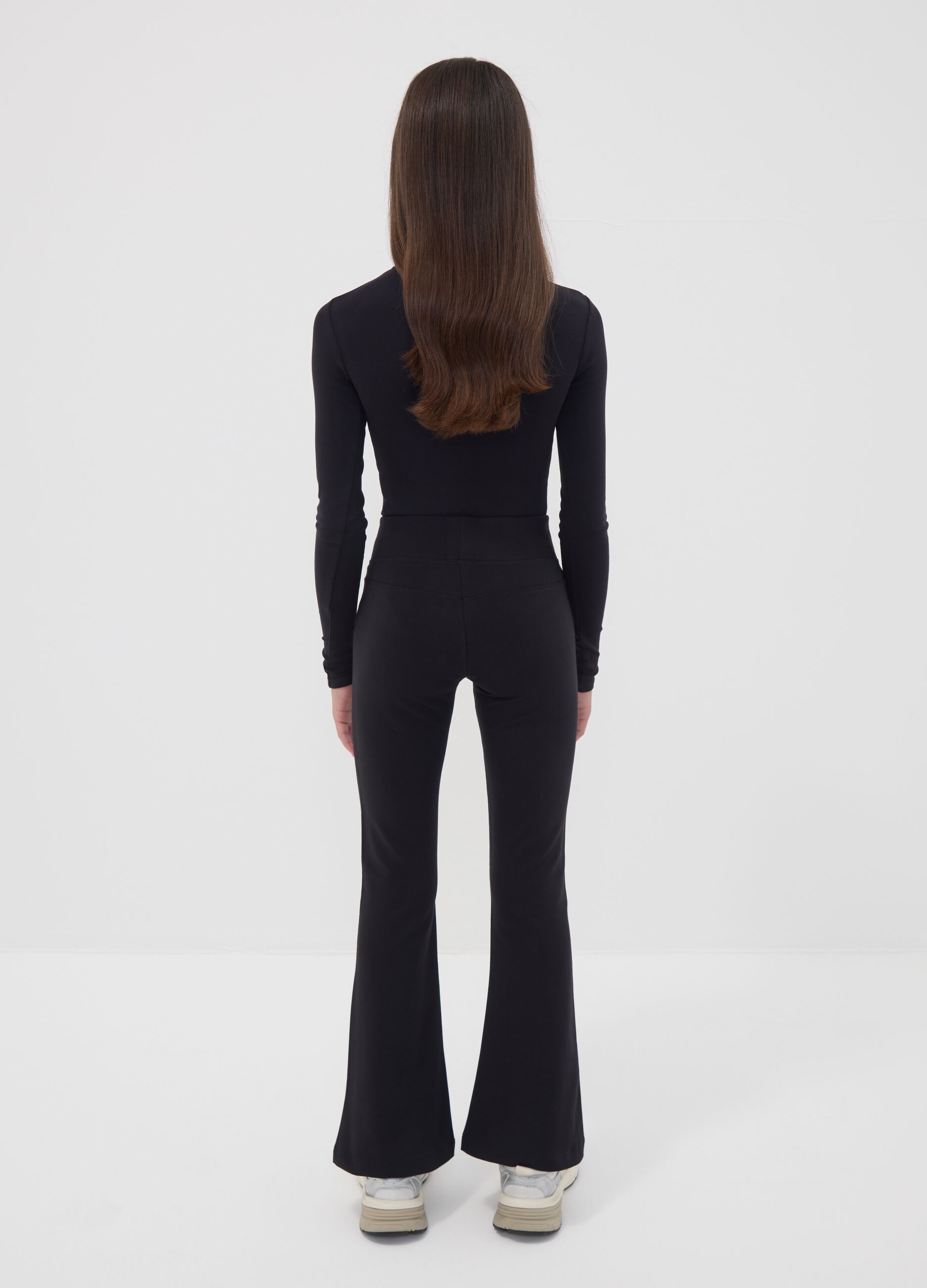 Black flared stretch organic cotton trousers for girls