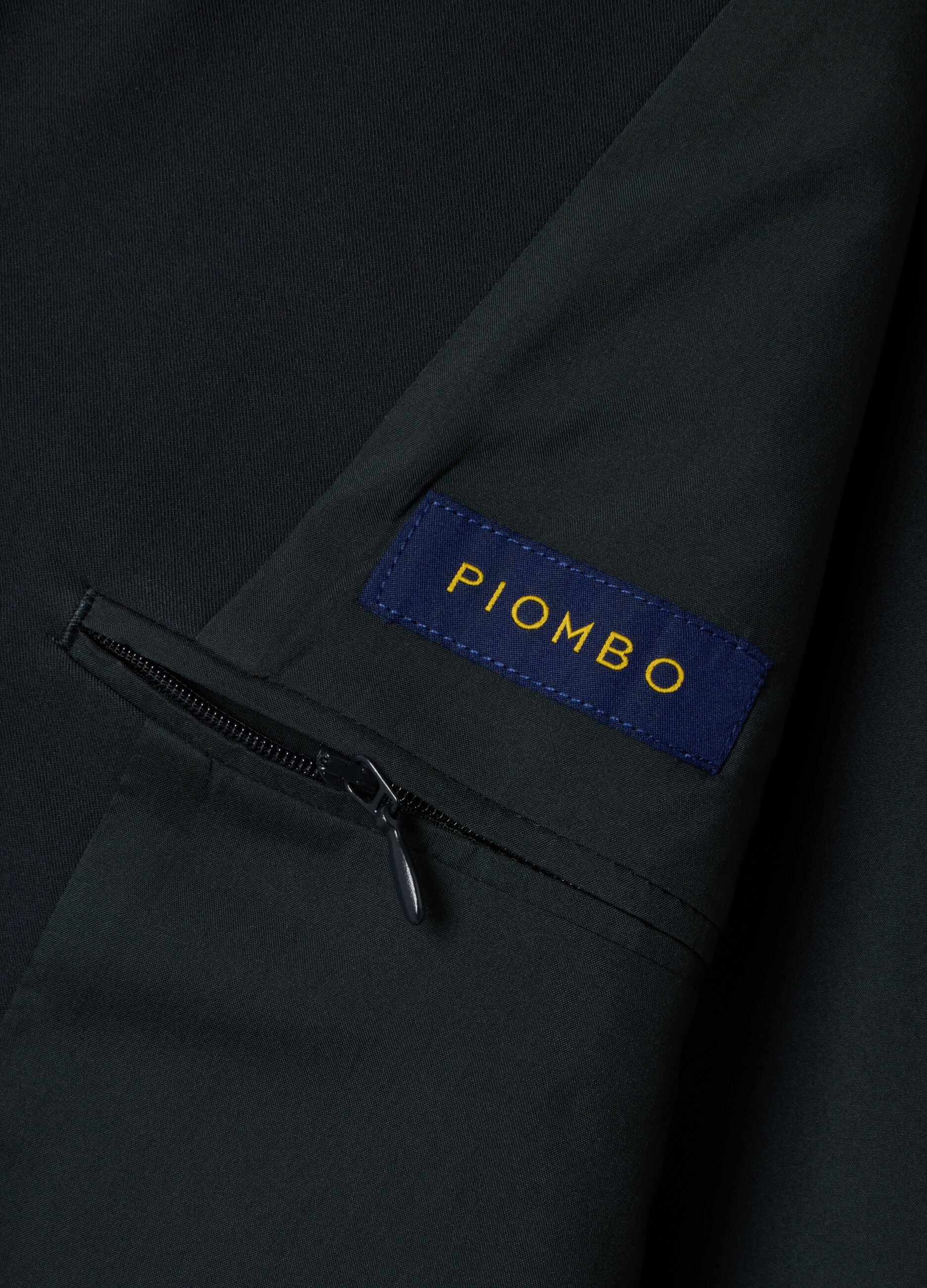 Blazer blu in twill di viscosa elasticizzata slim fit con rever a lancia