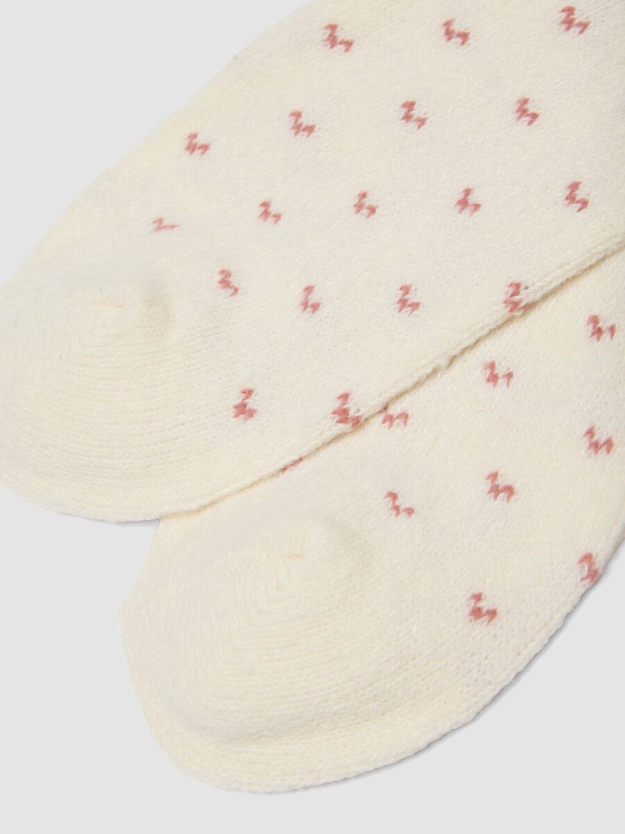 Calzini bianchi in tessuto elasticizzato con fantasia jacquard_2