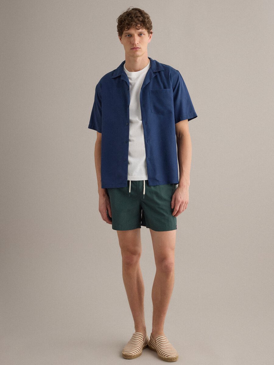 Green swim shorts with elasticated waistband and drawstring_3