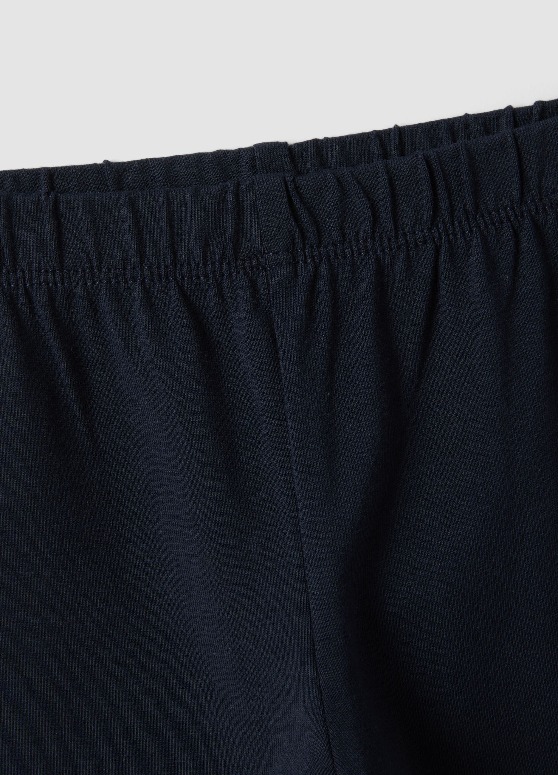 Leggings blu flare in cotone organico elasticizzato con cuore per bimba