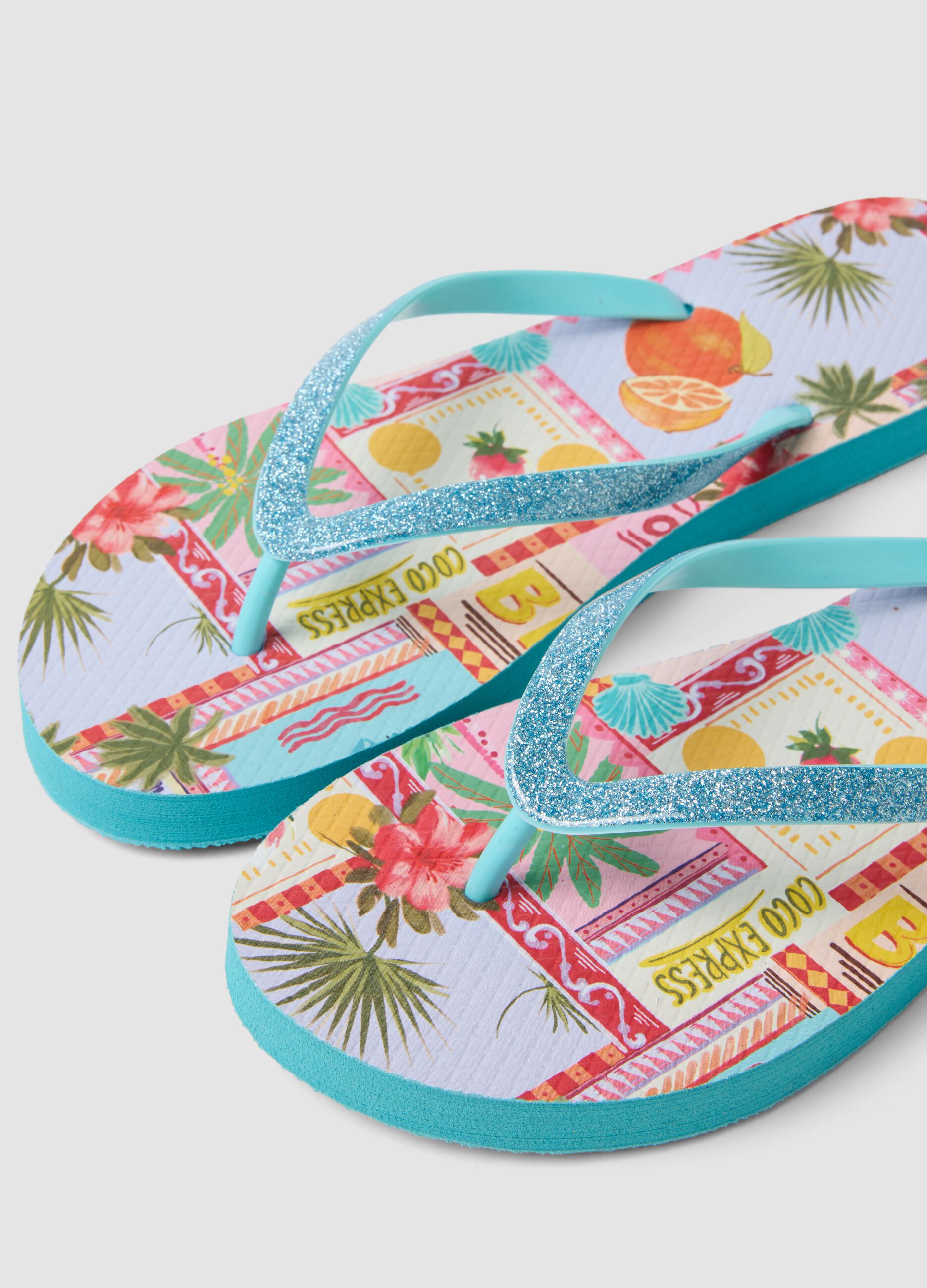 Blue multicolour tropical print flip-flops
