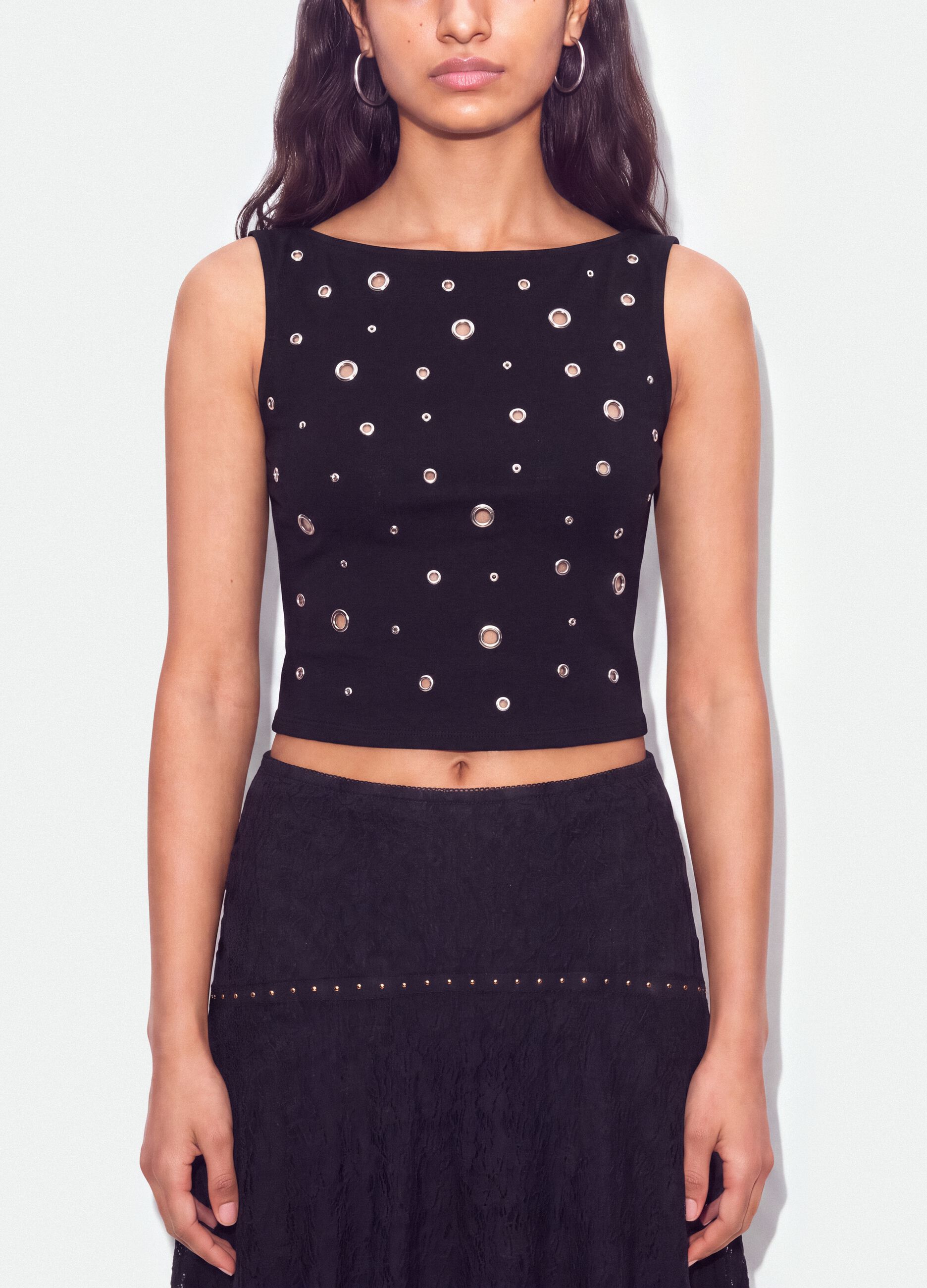 Black stretch cotton top with metal eyelets, regular fit