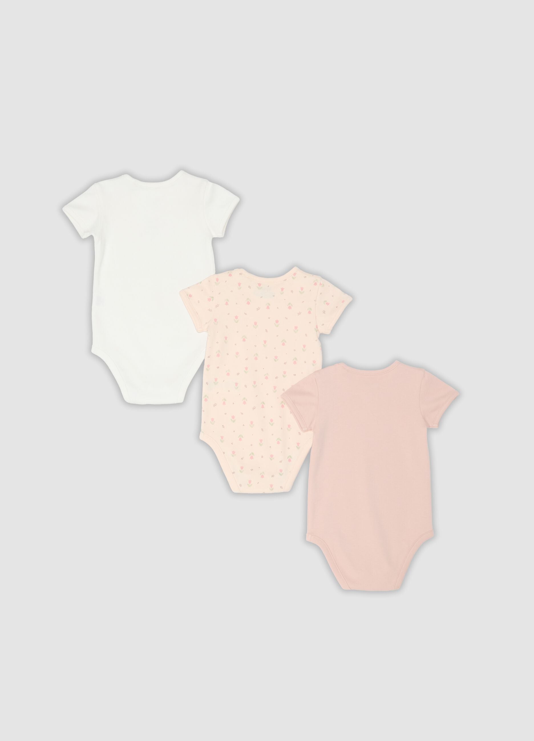 Tripack di body multicolor in puro cotone organico per neonata