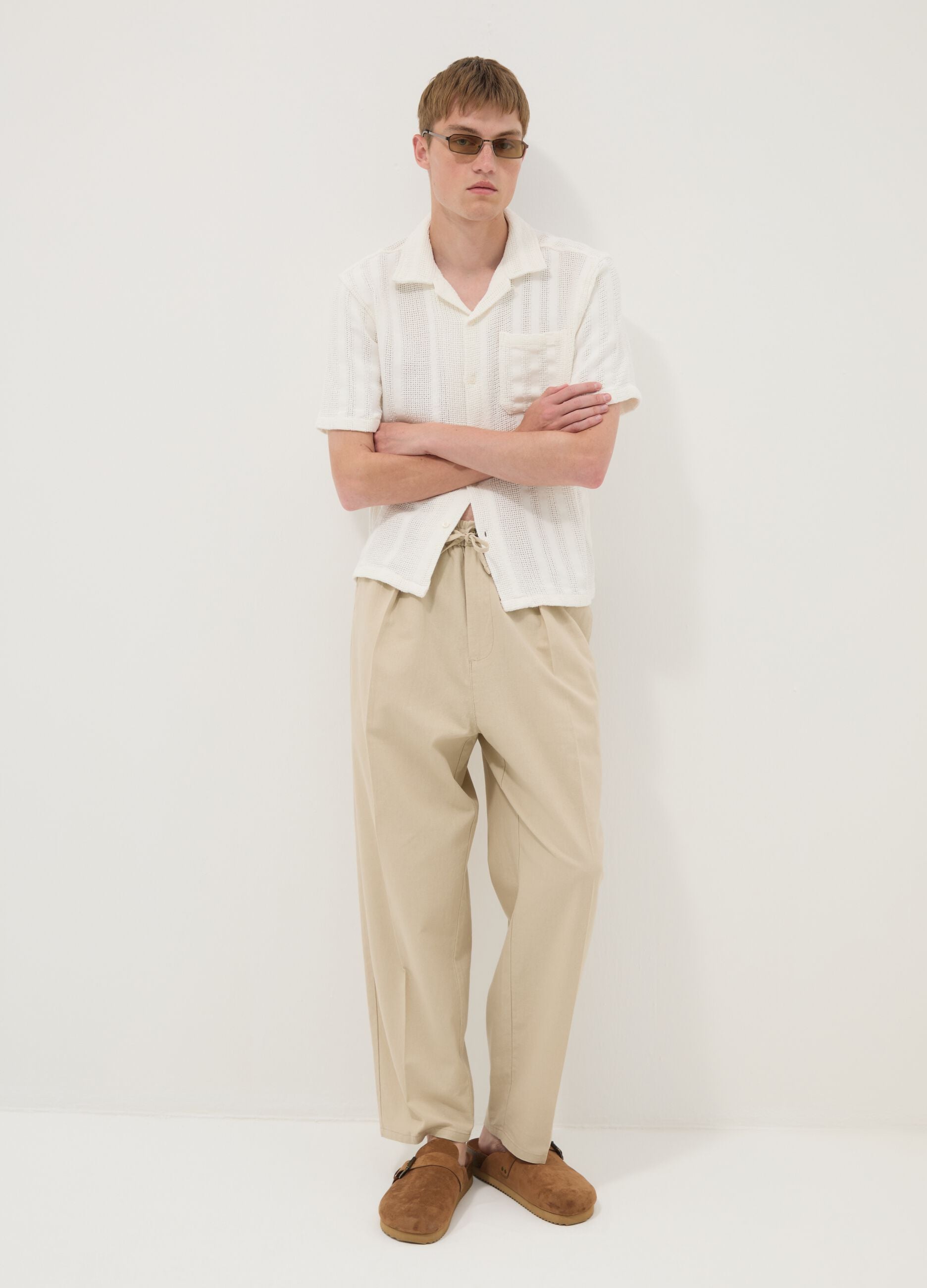 Beige linen-cotton blend trousers with an elasticated waist