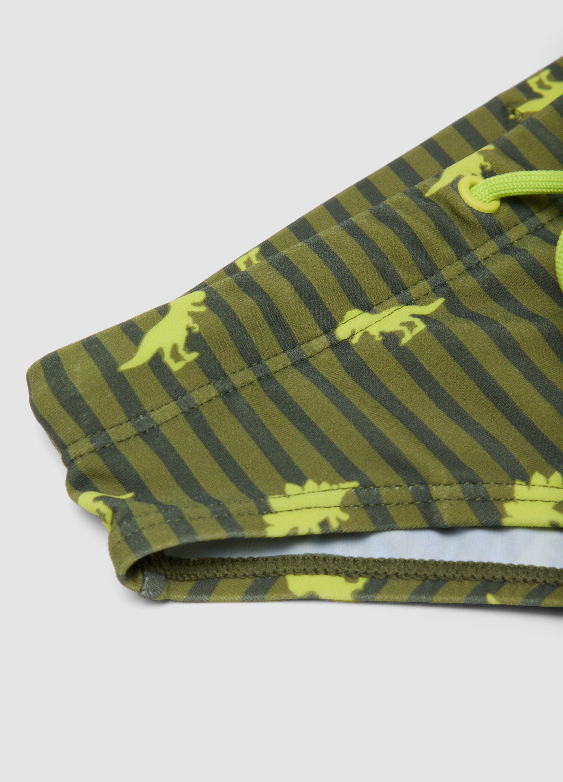 Gr&uuml;ne Stretch-Badehose mit Dino-Print