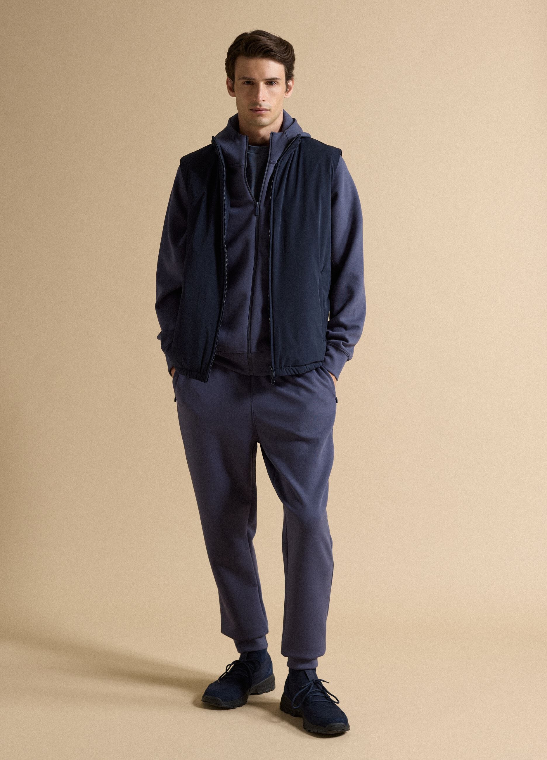 Blue stretch-fabric gilet with zip