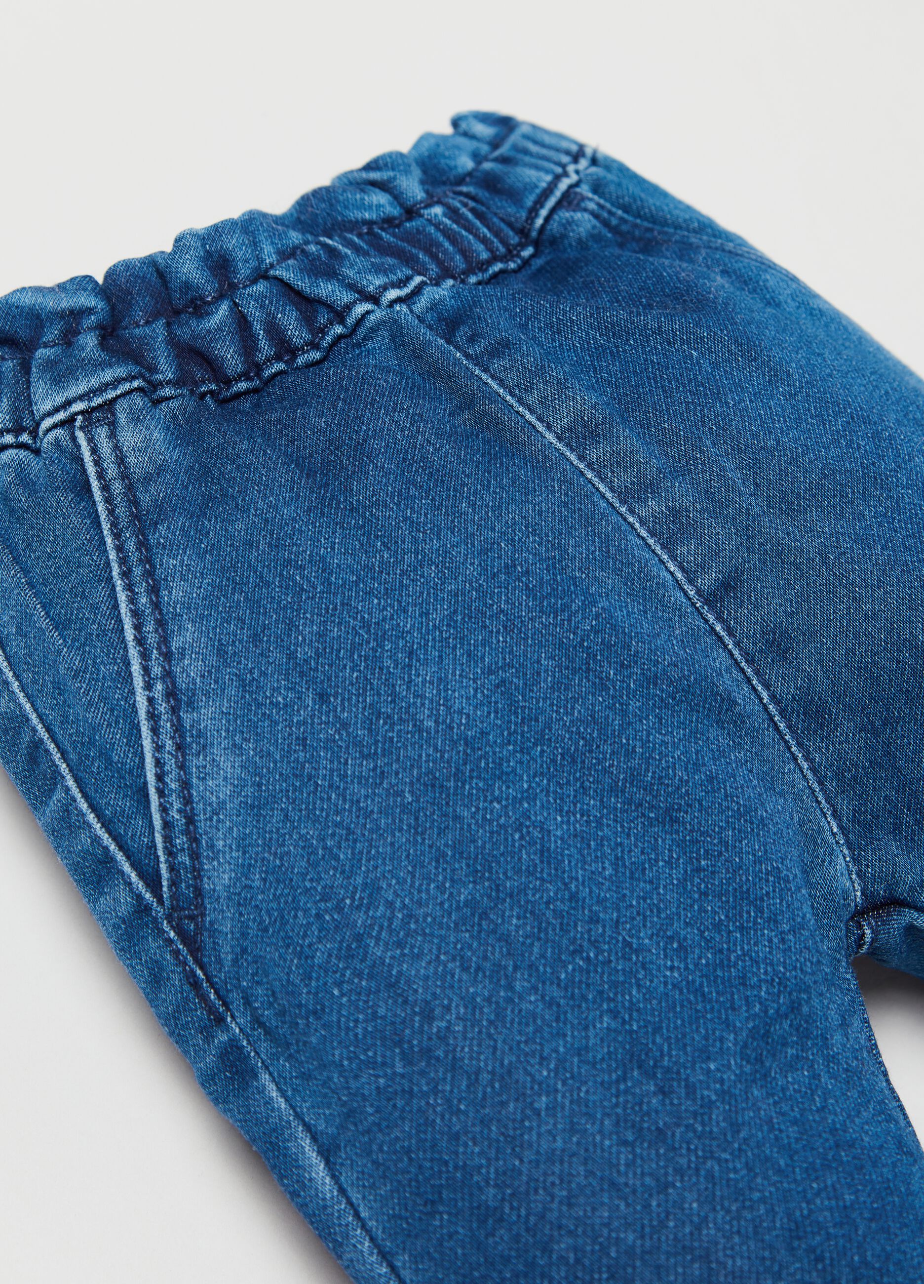 Jeans with ruffles and pocket