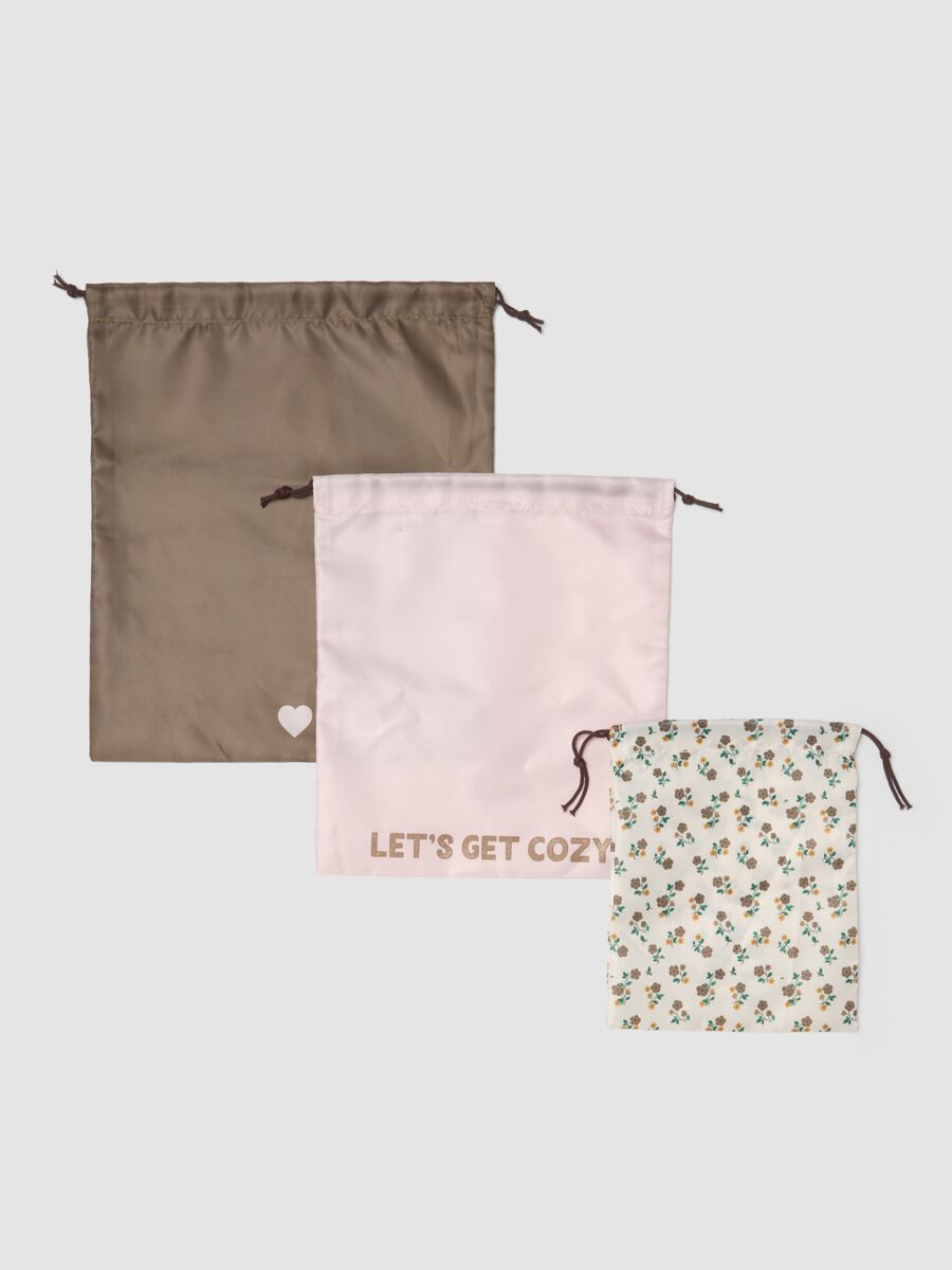 Set of three drawstring pouches in taupe grey, pale pink and off-white_0