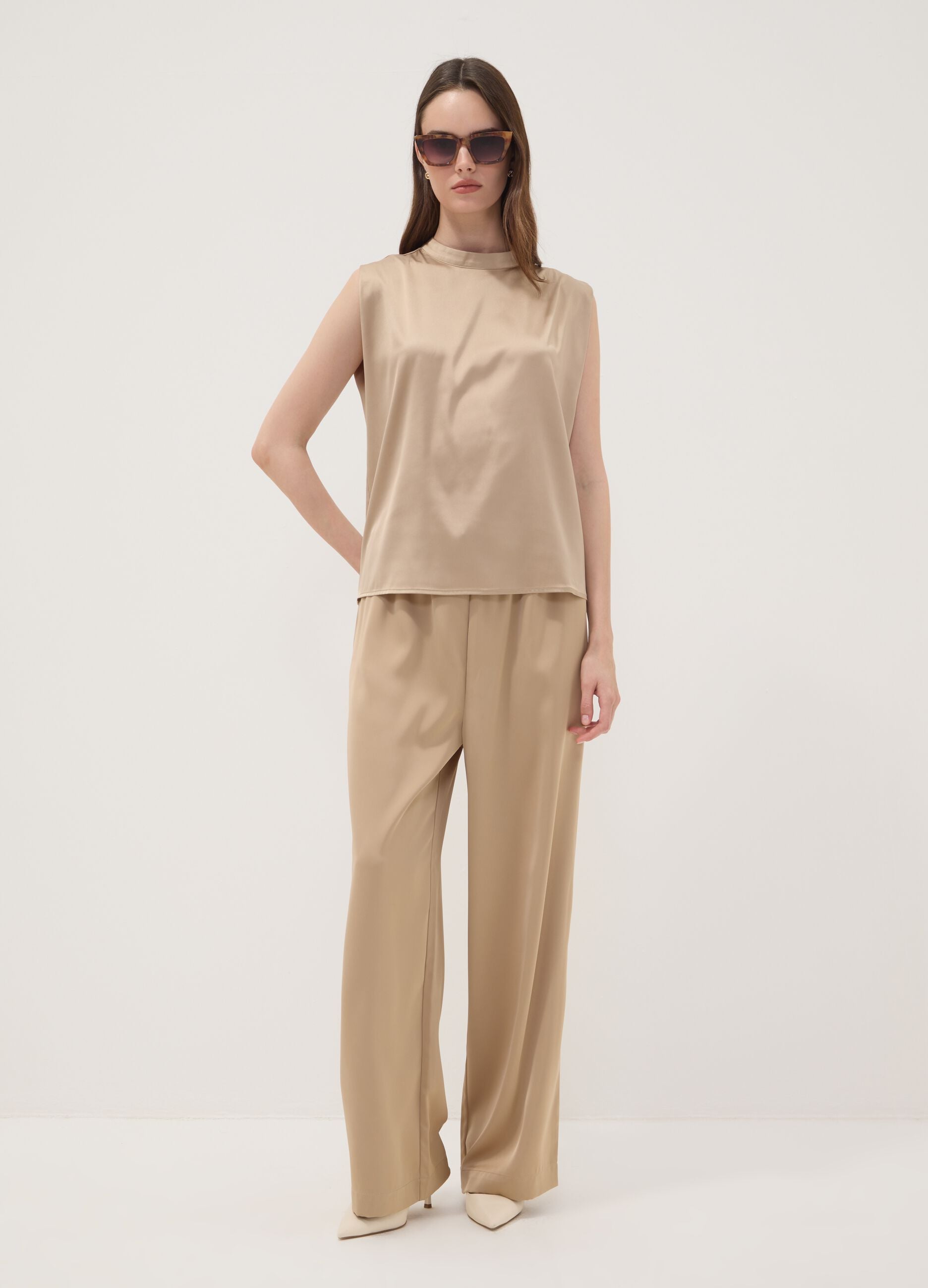 Beige wide-leg trousers with regular waist