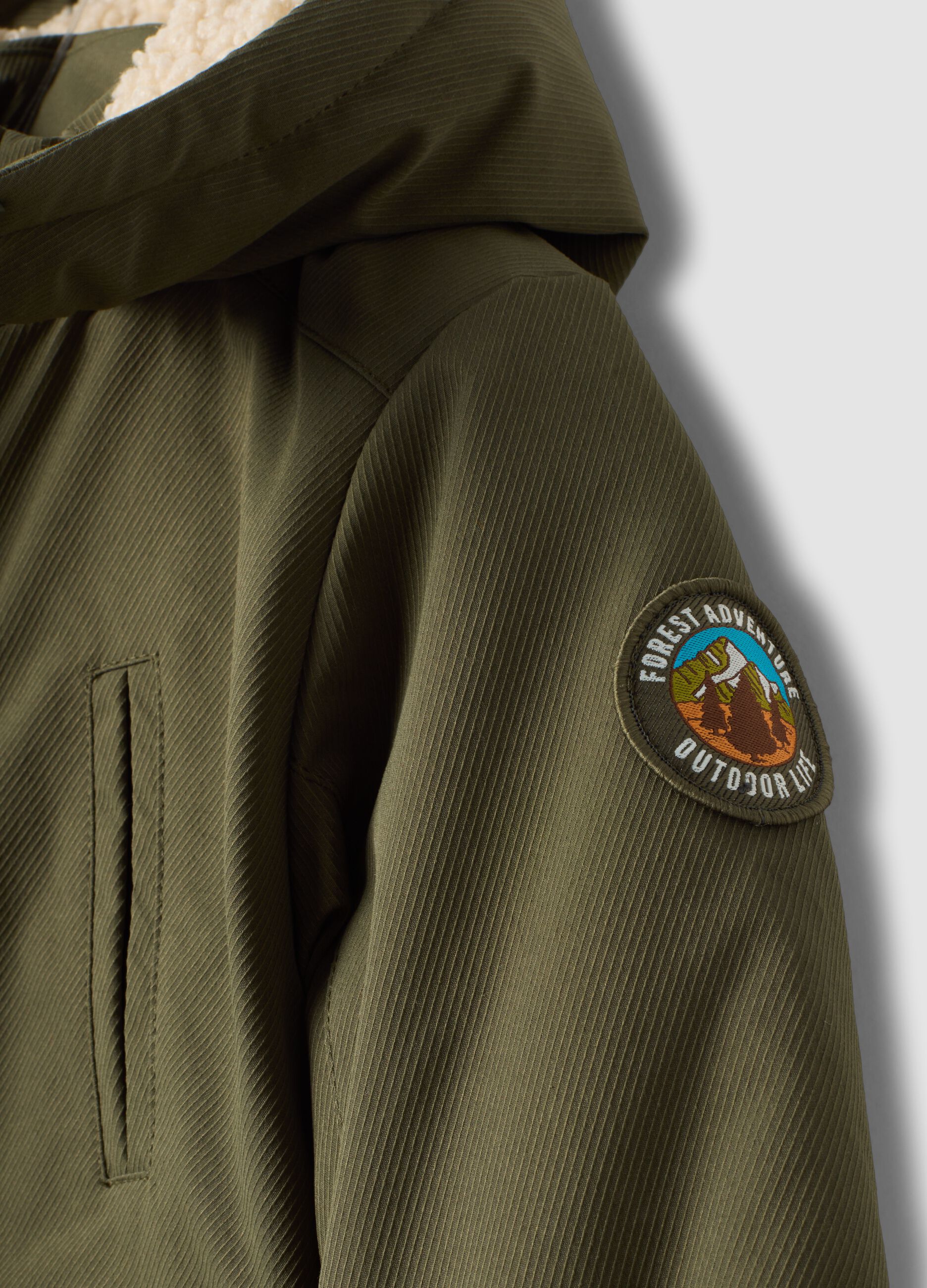 Long padded green parka with hood