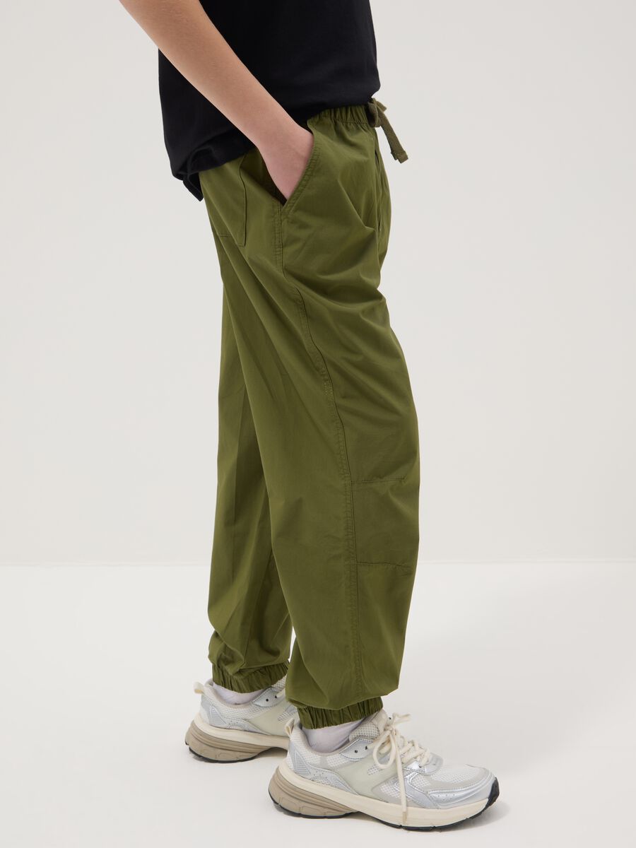 Boy's green wide leg trousers in pure cotton_1