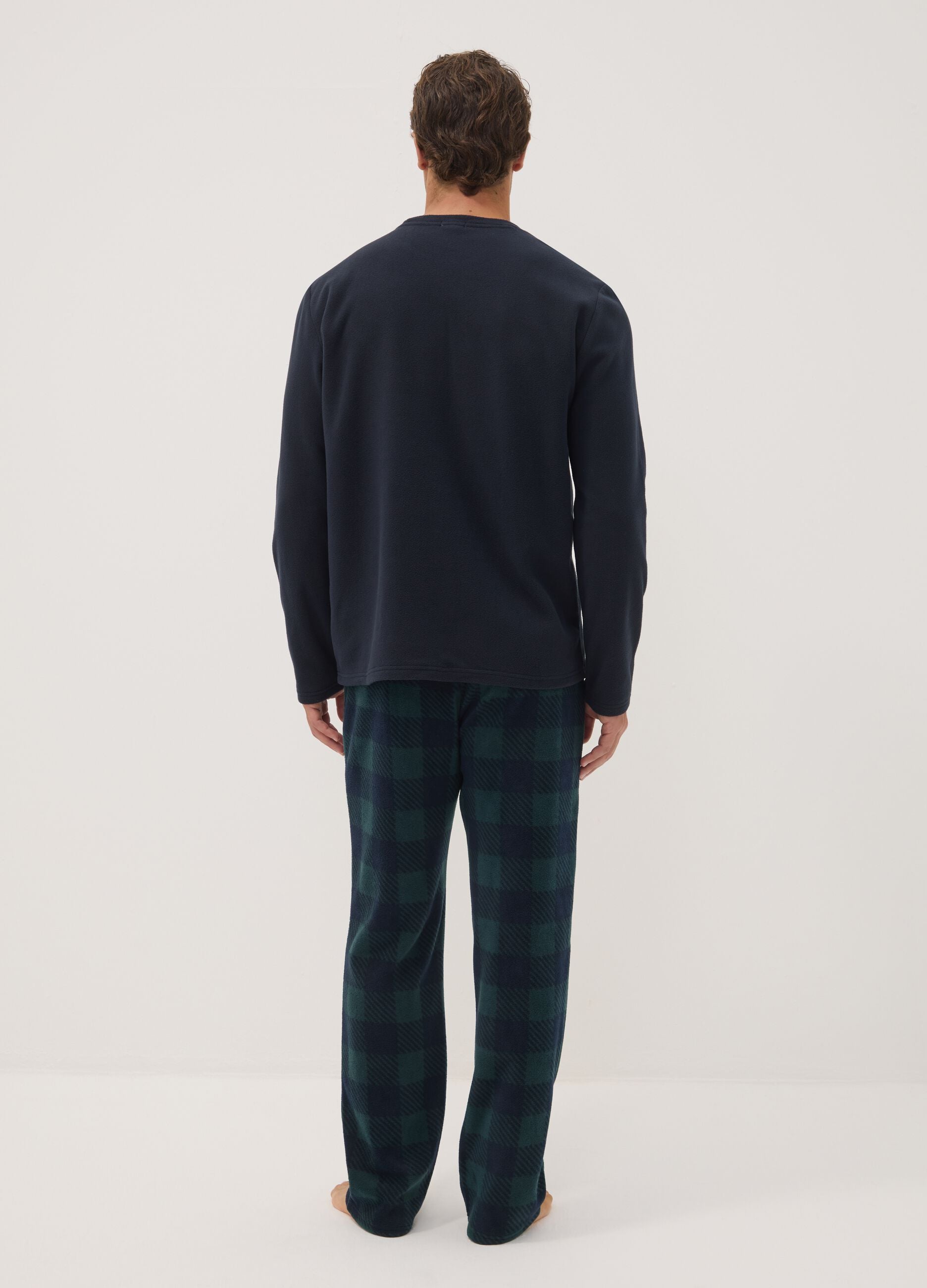 Navy blue long pyjamas with crew neck top and check trousers