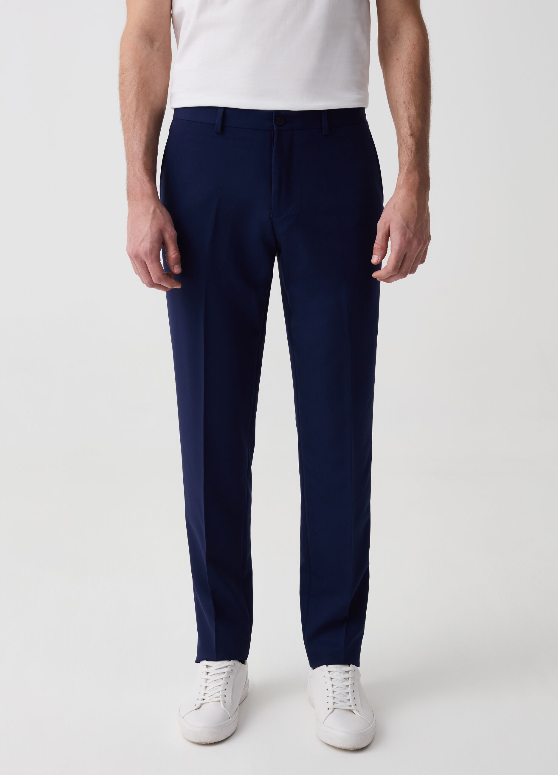 Solid colour slim-fit trousers