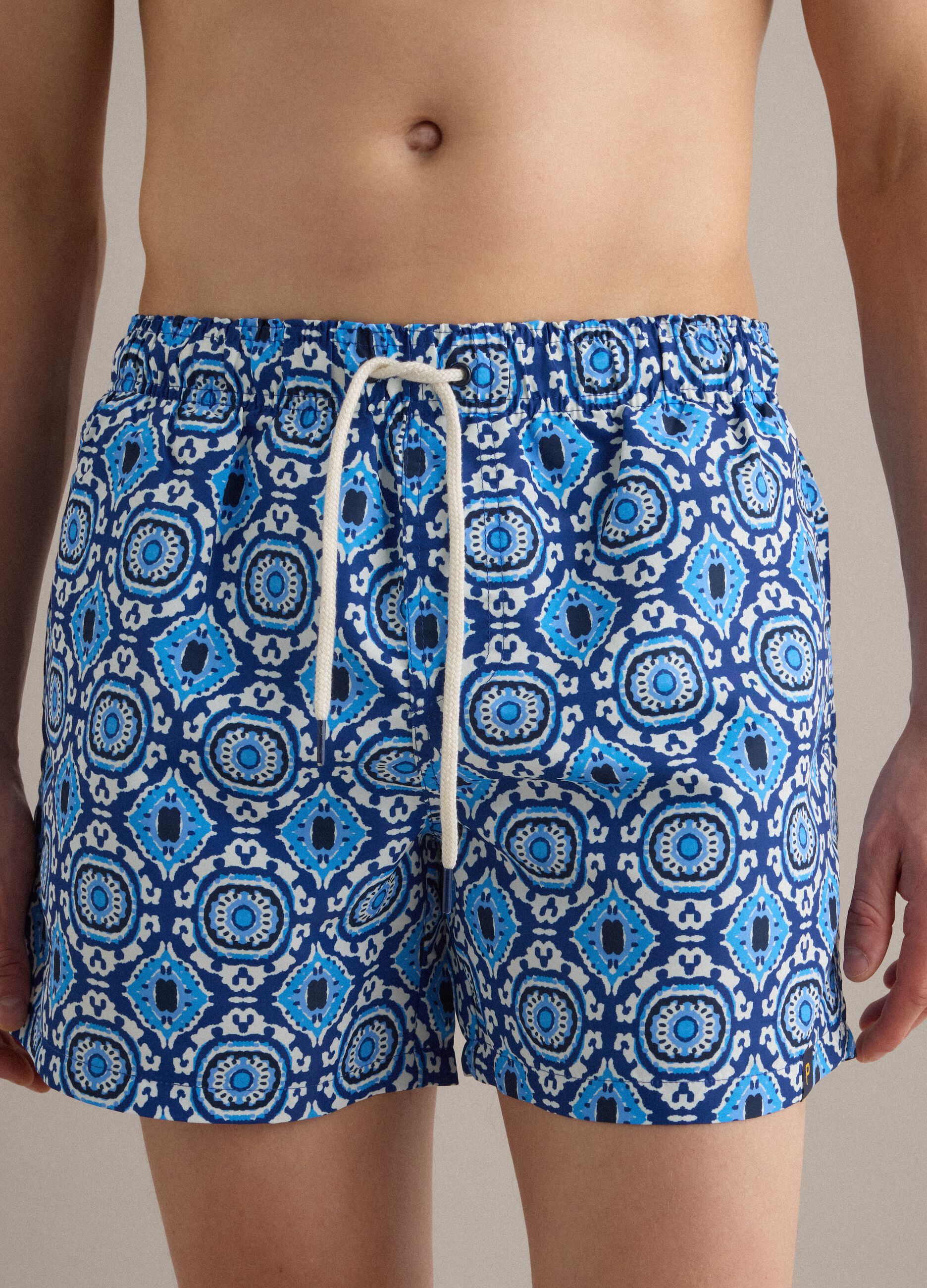 Blue patterned swim shorts