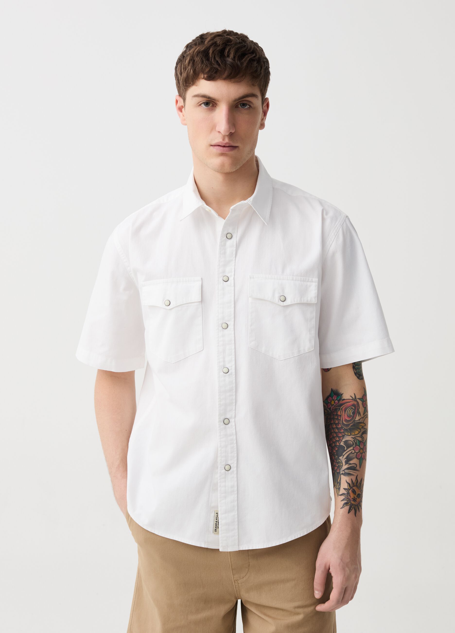Solid colour denim shirt with short sleeves