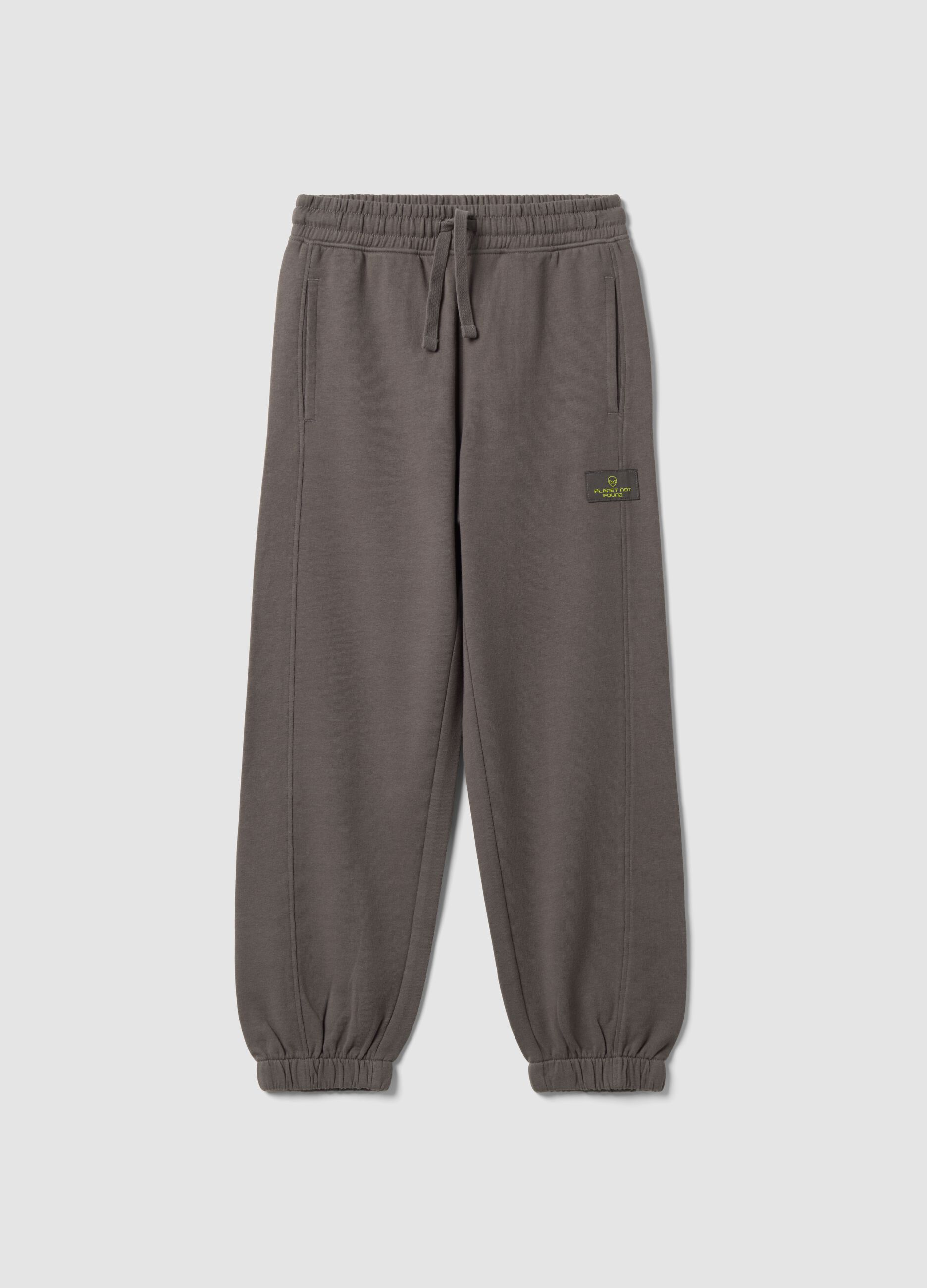 Cal&ccedil;as jogger cinzentas em algod&atilde;o puro, corte oversized, para rapaz