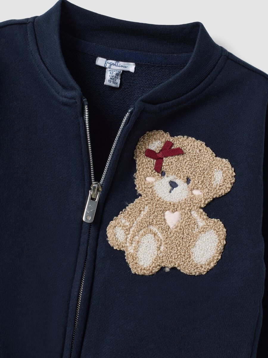 Blue pure cotton sweatshirt with crew neck, zip and teddy bear detail for baby girl_2