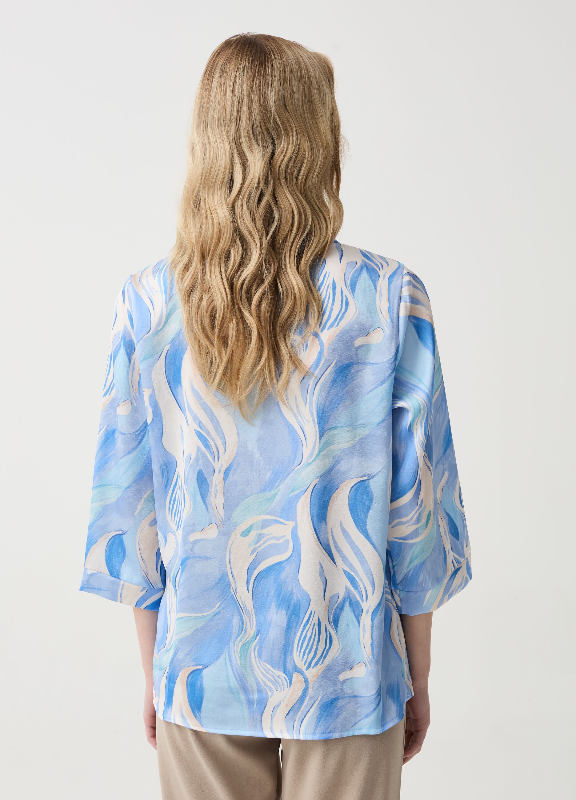 Blouse with V-shaped opening and watercolour print