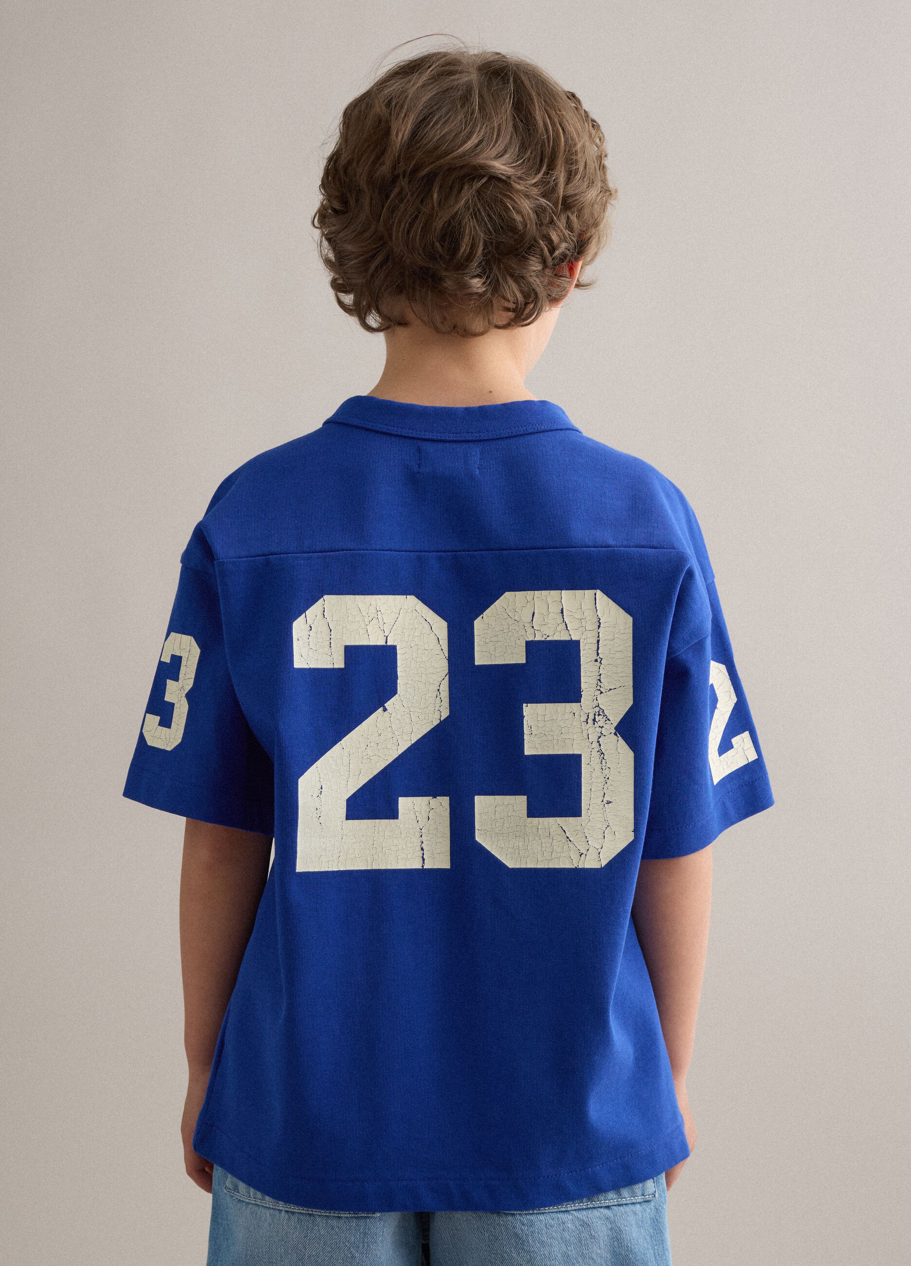 T-shirt azul oversize de algod&atilde;o puro para crian&ccedil;a com estampas