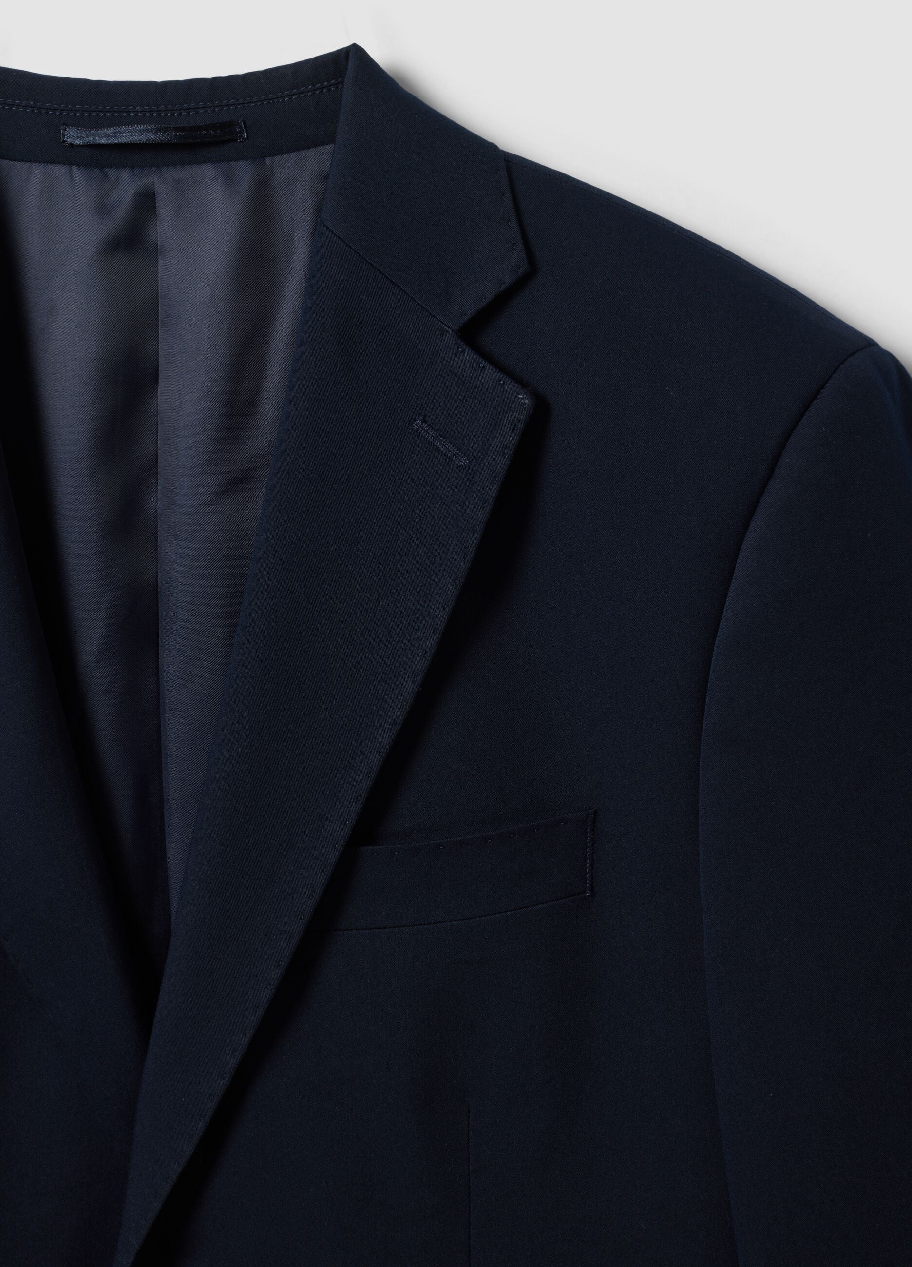 Blazer azul em viscose el&aacute;stica com lapelas cl&aacute;ssicas