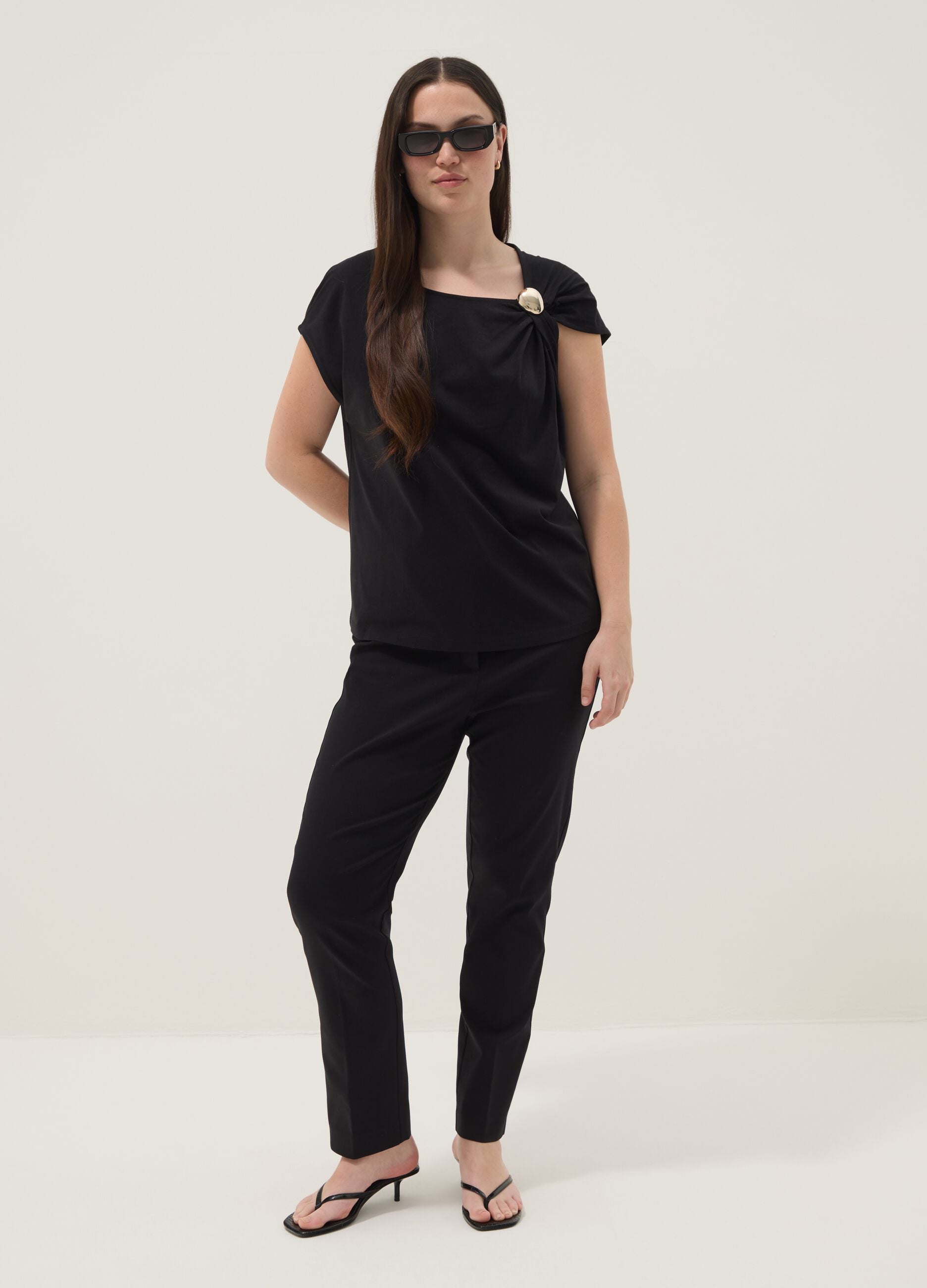 Black pure cotton T-shirt with draping and brooch