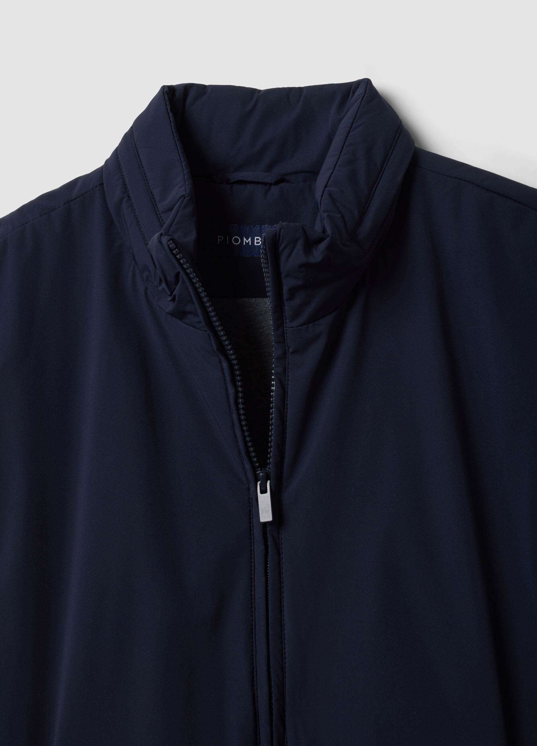 Blue stretch-fabric gilet with zip