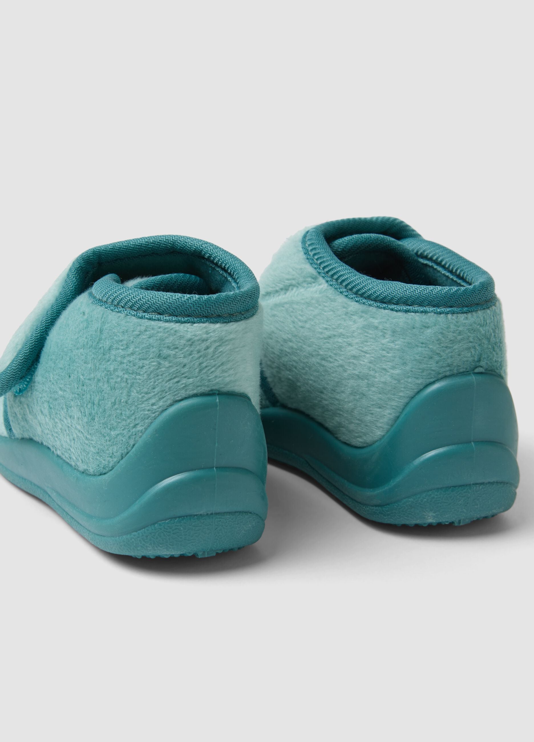 Green baby slippers with hook-and-loop fastening and embroidery