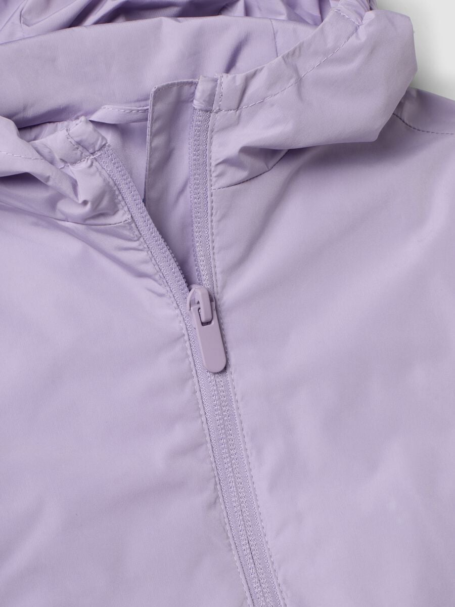 Giacca antipioggia viola con cappuccio e zip per bimba_2