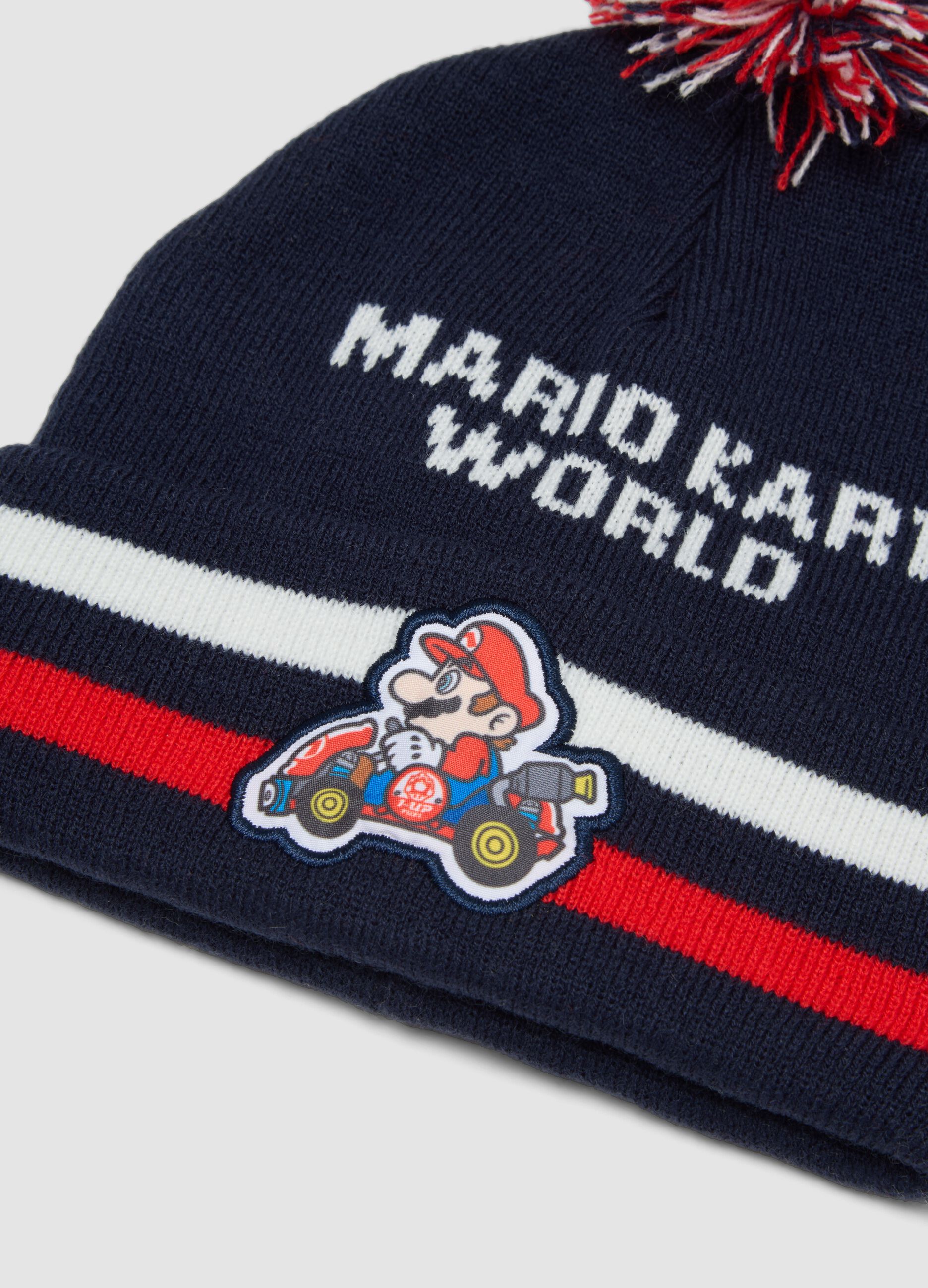 Cappello blu indigo in maglia con pon pon e stampa Mario Kart