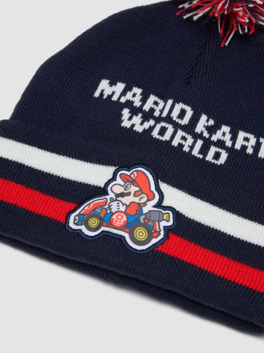 Cappello blu indigo in maglia con pon pon e stampa Mario Kart_2